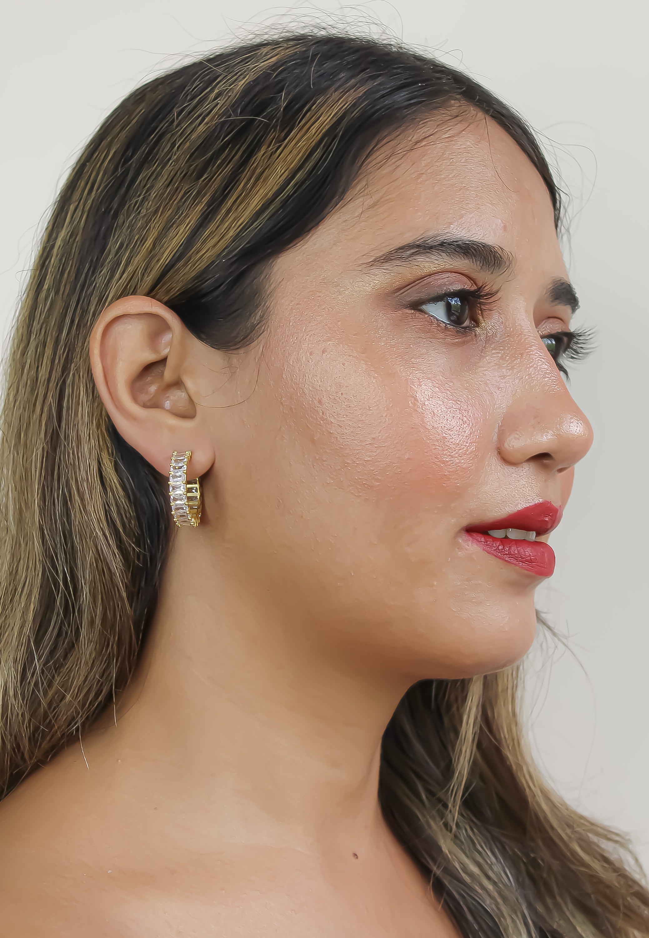 Elegant Downtown Earrings featuring 18K gold plating and emerald cut zirconia stones, perfect for pierced ears.