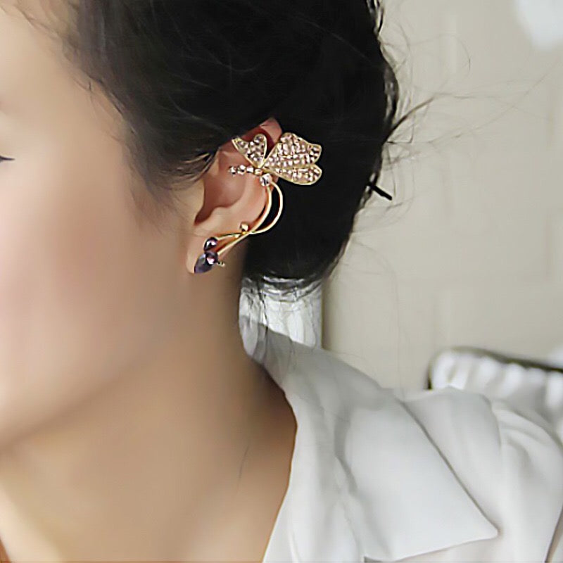 Dramatic butterfly ear bone clips made of alloy, showcasing an elegant design with intricate butterfly details.