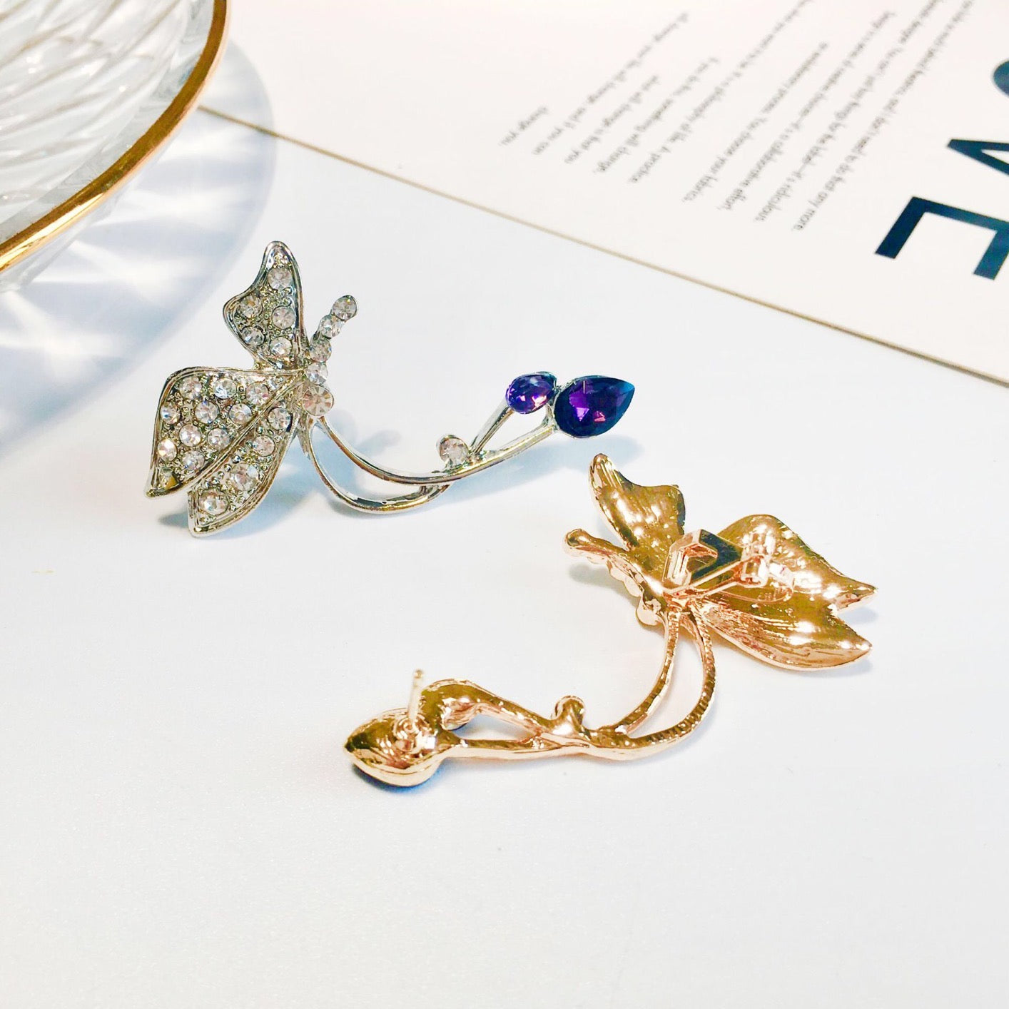 Dramatic butterfly ear bone clips made of alloy, showcasing an elegant design with intricate butterfly details.