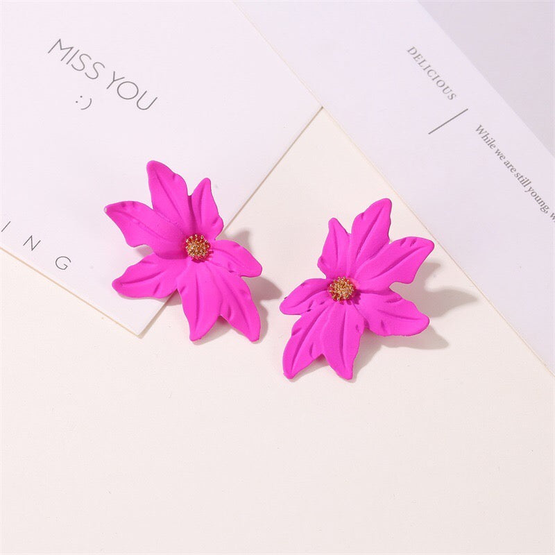 Dramatic flower stud earrings made of alloy, featuring intricate floral design and lightweight construction.