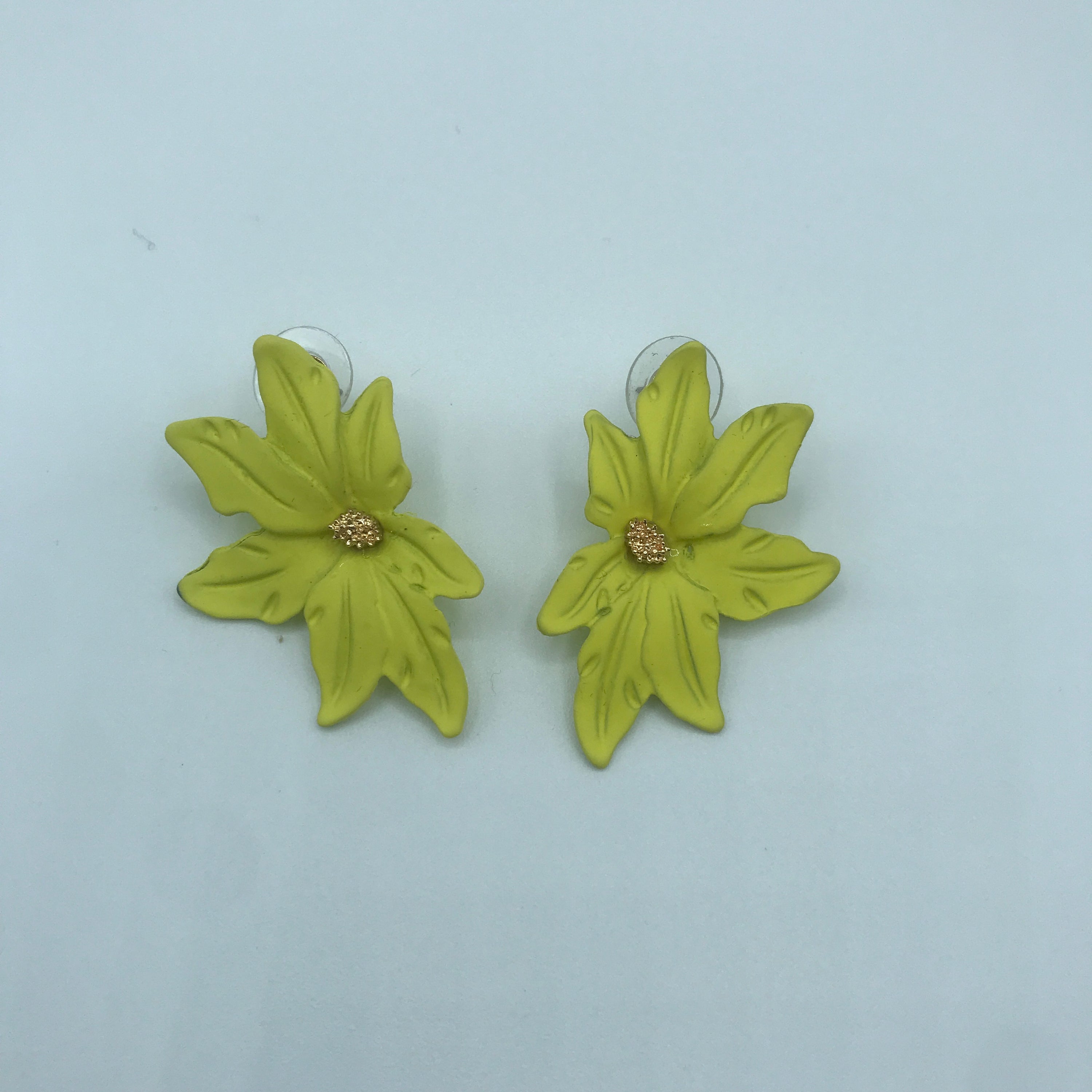 Dramatic flower stud earrings made of alloy, featuring intricate floral design and lightweight construction.