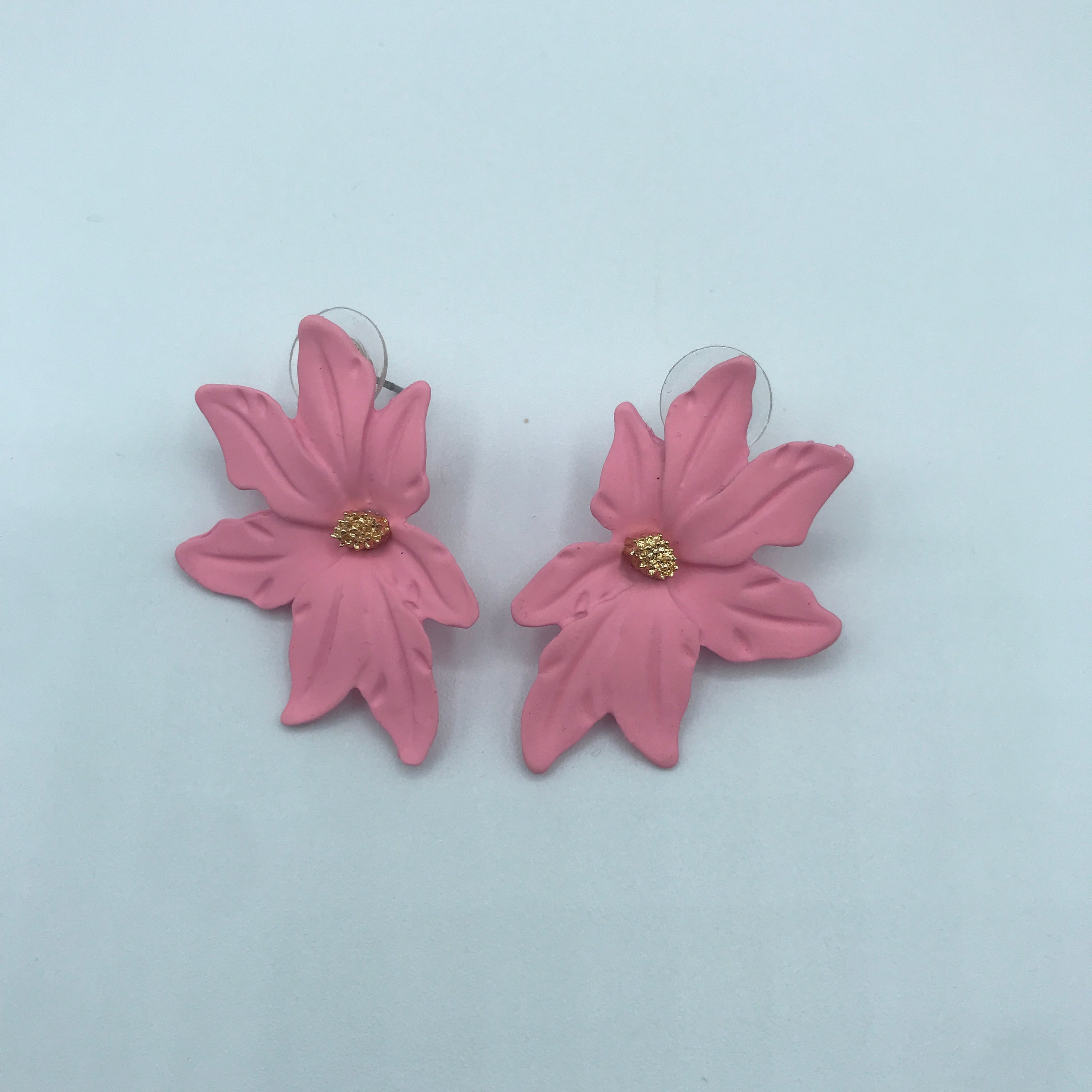 Dramatic flower stud earrings made of alloy, featuring intricate floral design and lightweight construction.