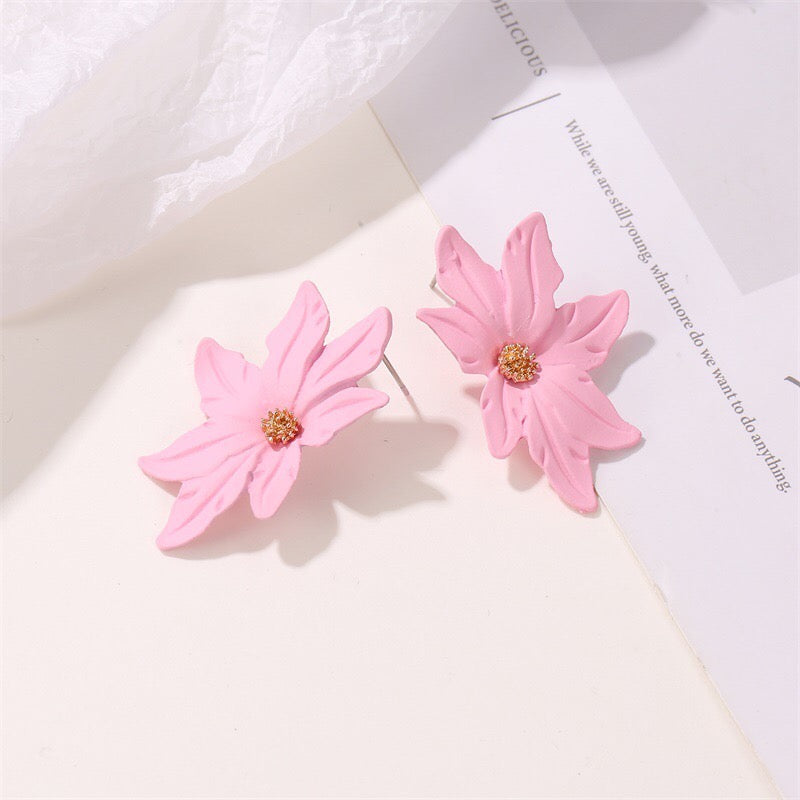 Dramatic flower stud earrings made of alloy, featuring intricate floral design and lightweight construction.