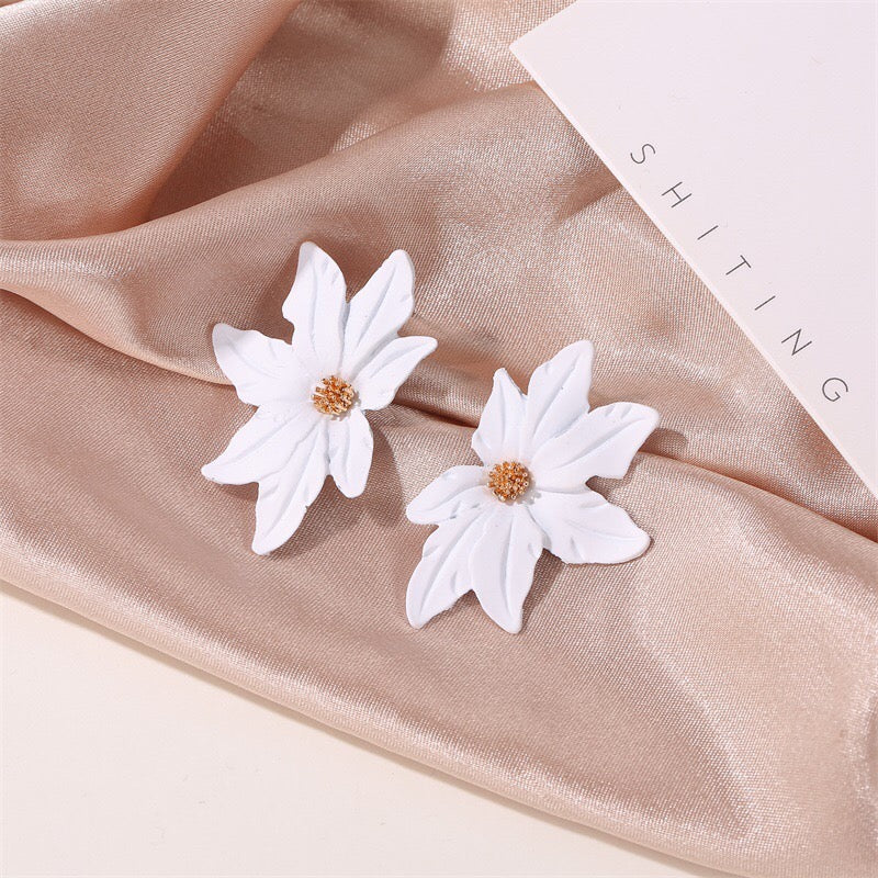 Dramatic flower stud earrings made of alloy, featuring intricate floral design and lightweight construction.