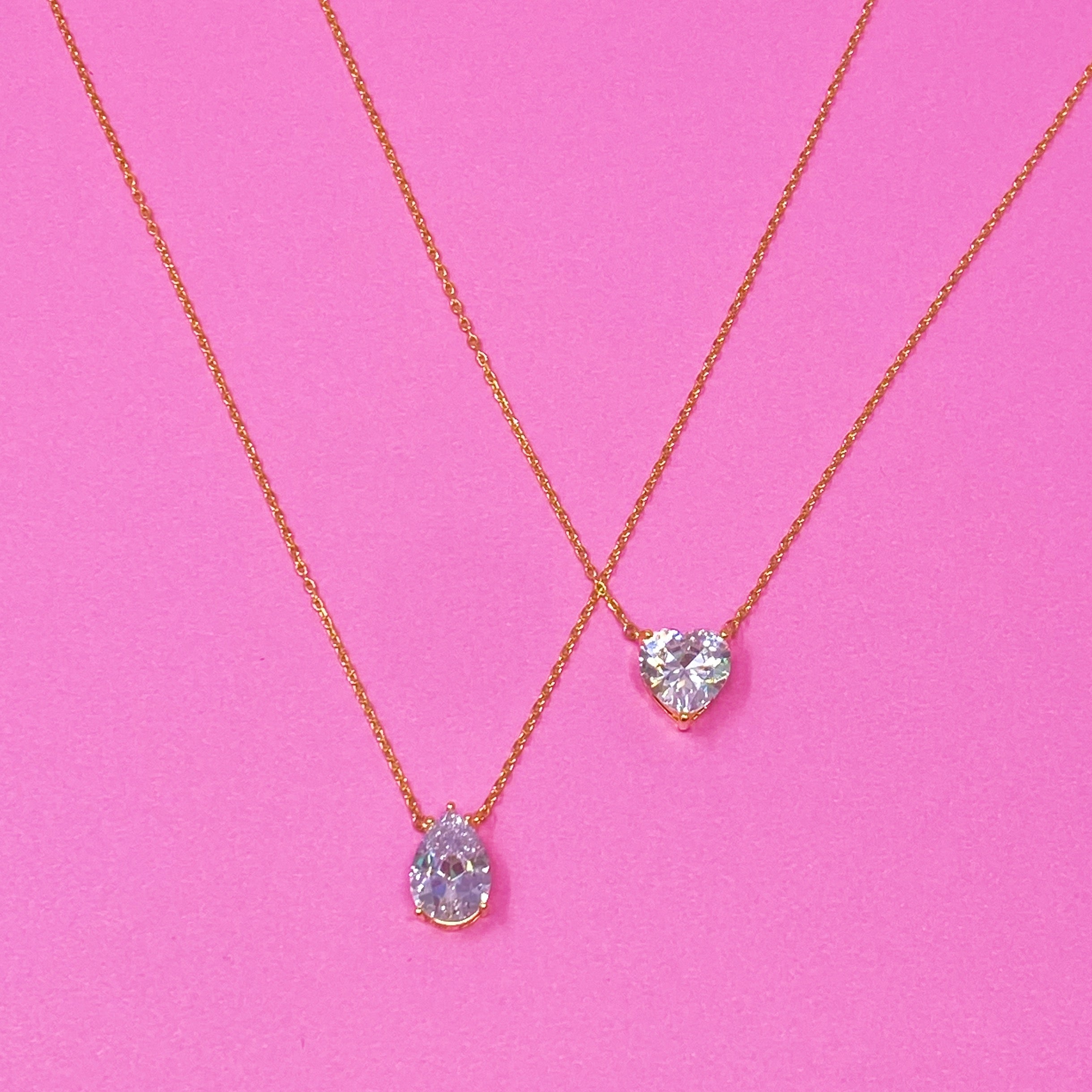 Dream It Solitaire Pendant Necklace featuring a single sparkling Cubic Zirconia stone on a gold plated stainless steel chain.