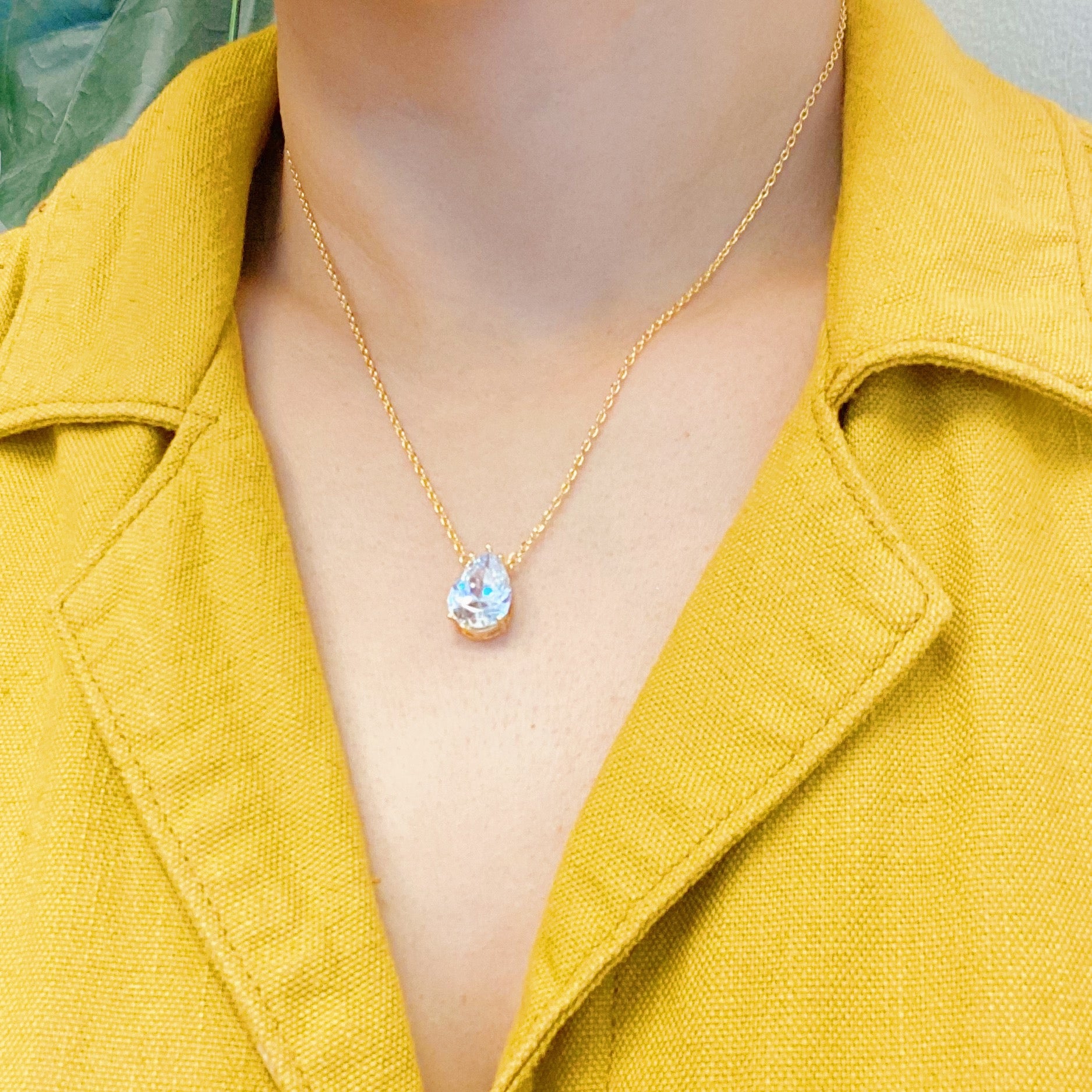 Dream It Solitaire Pendant Necklace featuring a single sparkling Cubic Zirconia stone on a gold plated stainless steel chain.