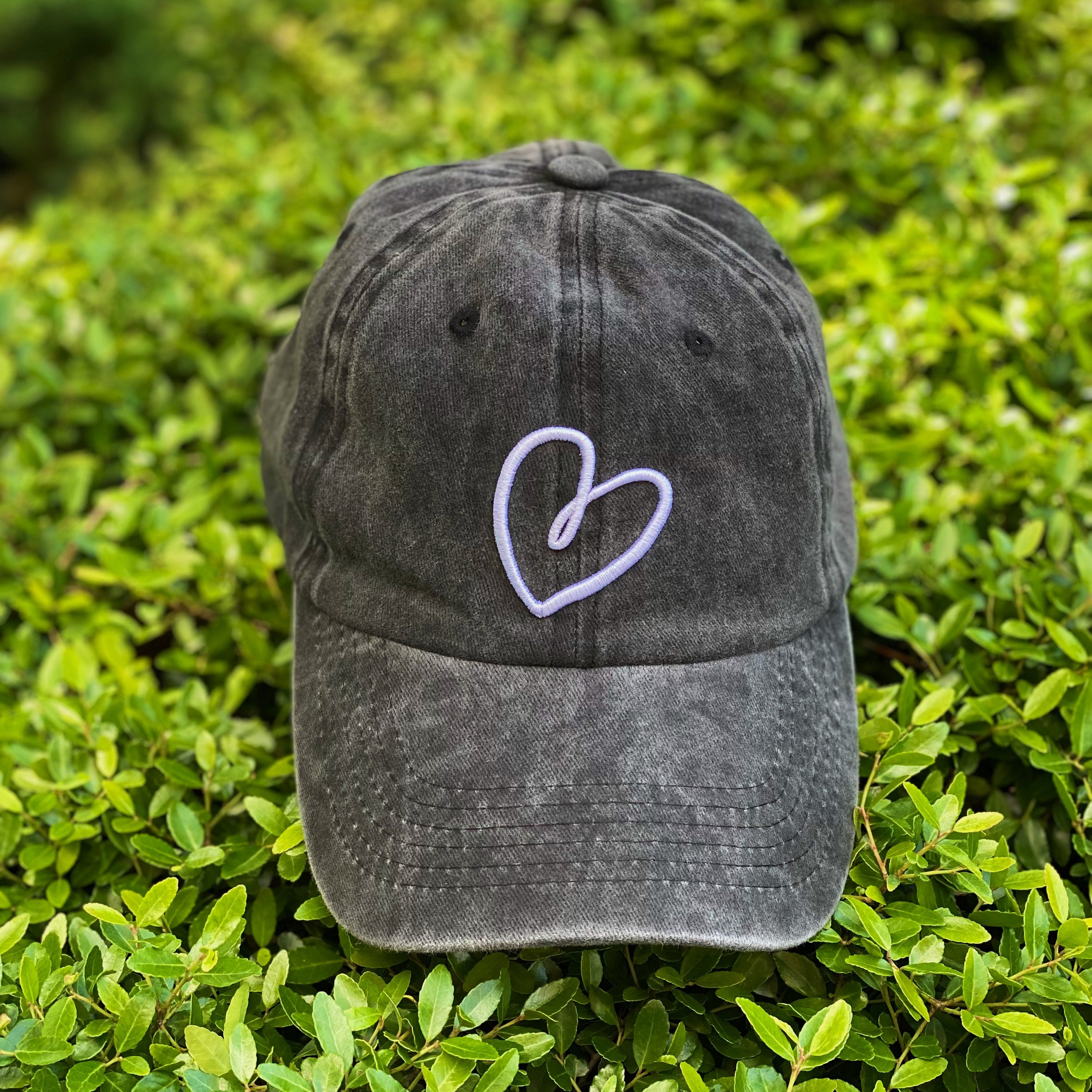 Dreaming Heart Ball Cap featuring 3D embroidery on washed cotton fabric, adjustable strap, and curved brim.