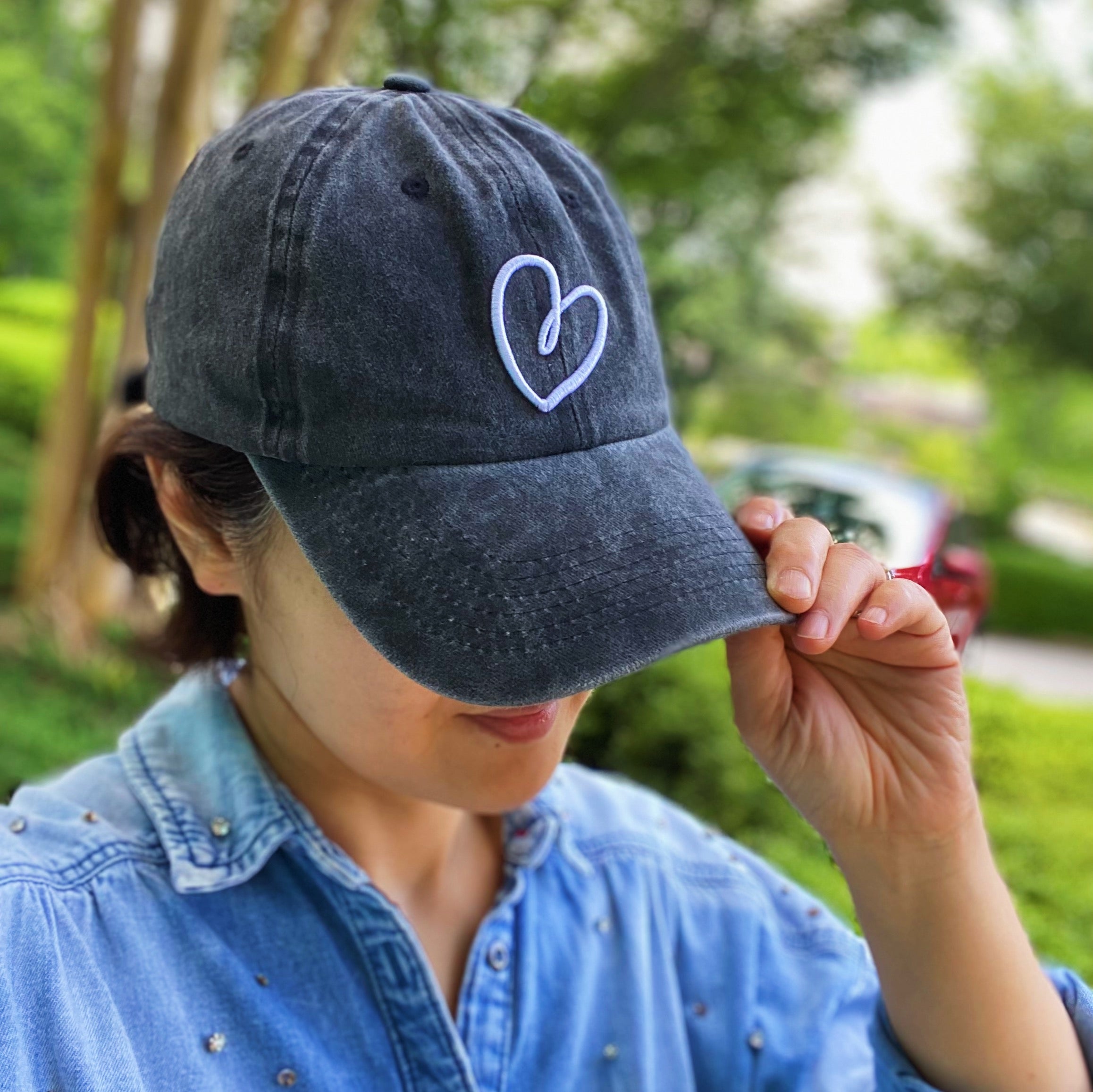 Dreaming Heart Ball Cap featuring 3D embroidery on washed cotton fabric, adjustable strap, and curved brim.