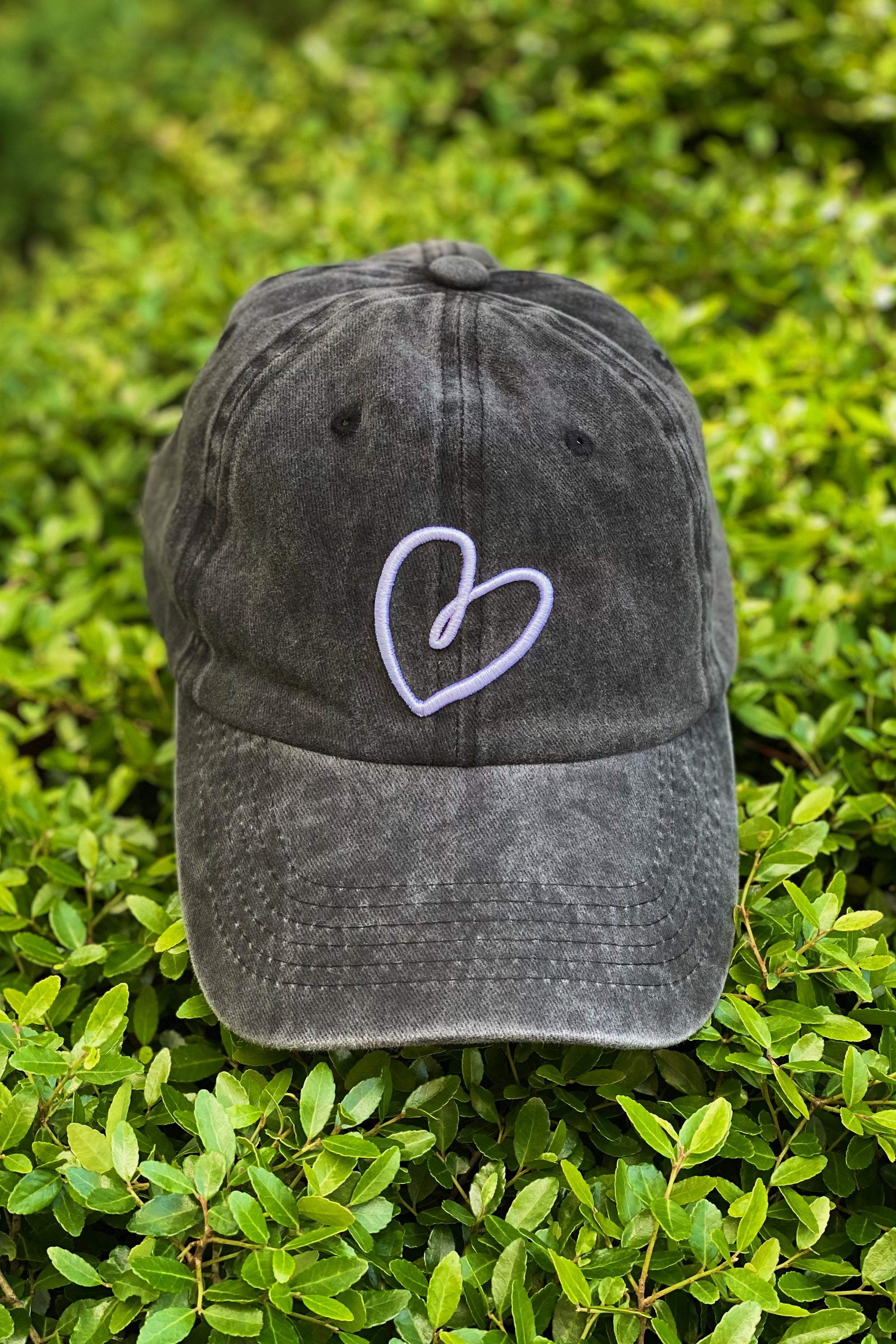 Dreaming Heart Ball Cap featuring 3D embroidery on washed cotton fabric, adjustable strap, and curved brim.