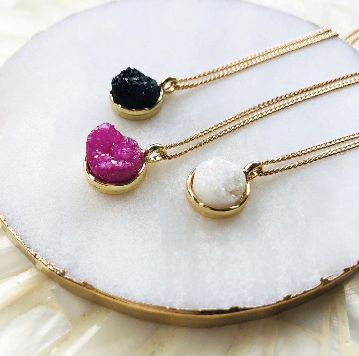 Druzy Sparkle Necklace featuring a colorful druzy stone on a 24K gold plated stainless steel chain.