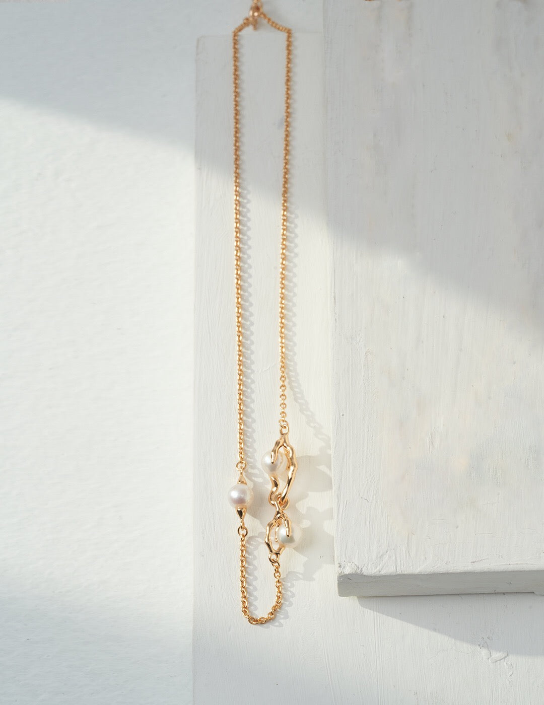 Elegant Dry Nest Branch Pearl Necklace featuring natural pearls and gold vermeil chain, showcasing a delicate branch design.