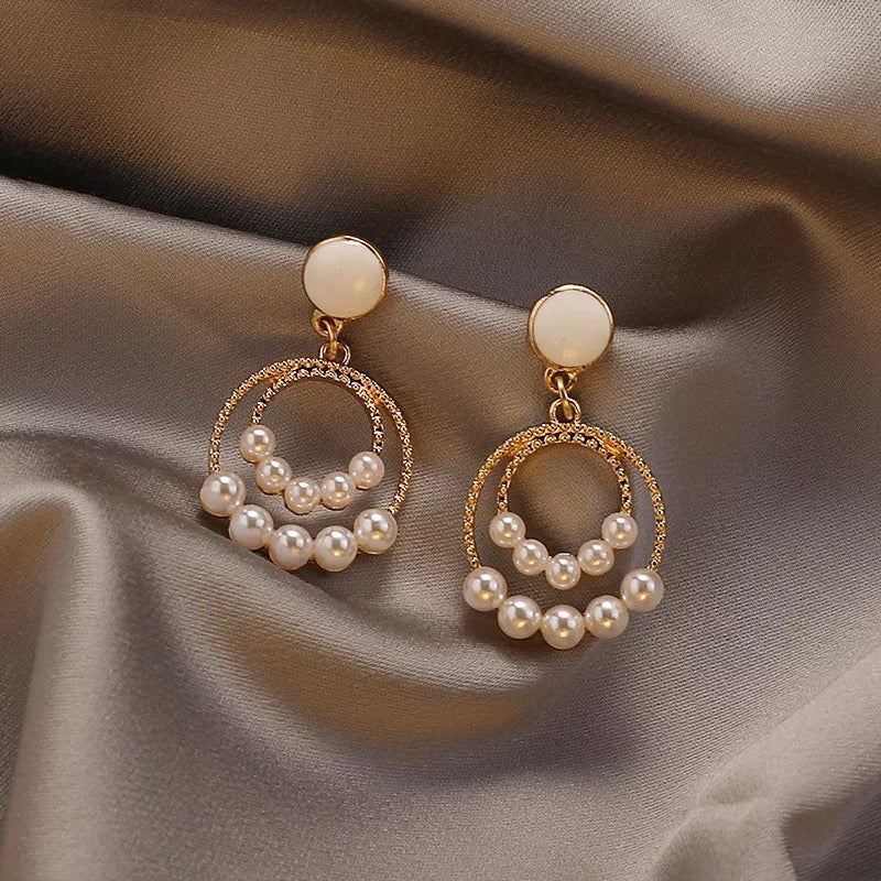 Elegant dual hoop earrings featuring artificial pearls, crafted from alloy and S925 silver.