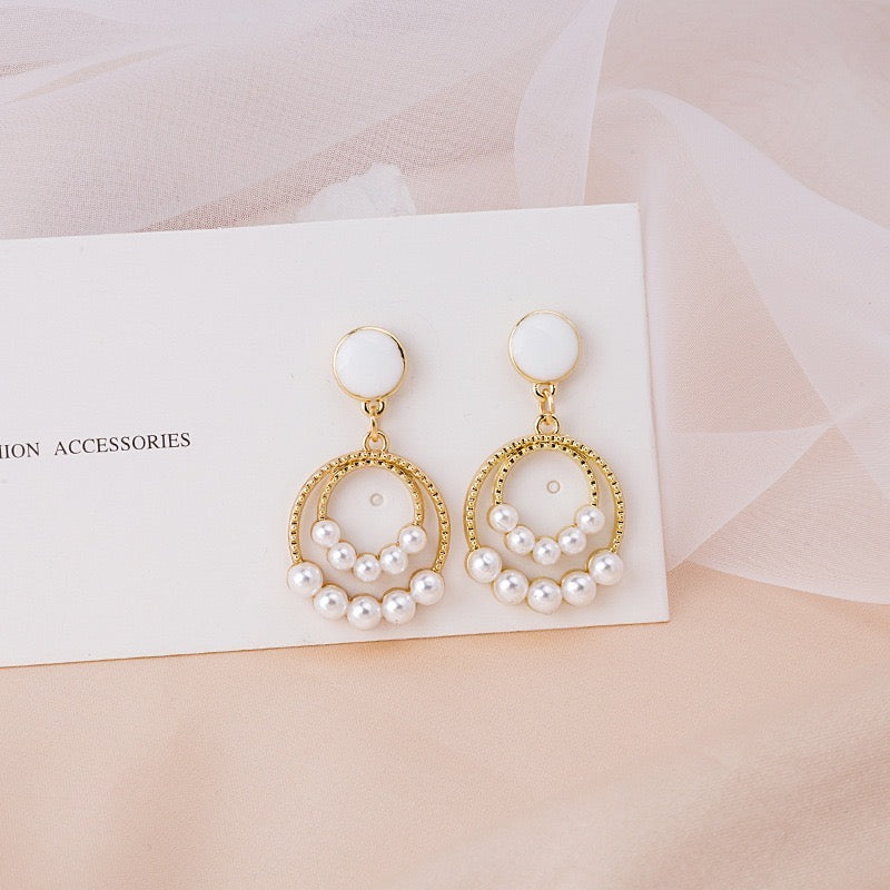 Elegant dual hoop earrings featuring artificial pearls, crafted from alloy and S925 silver.