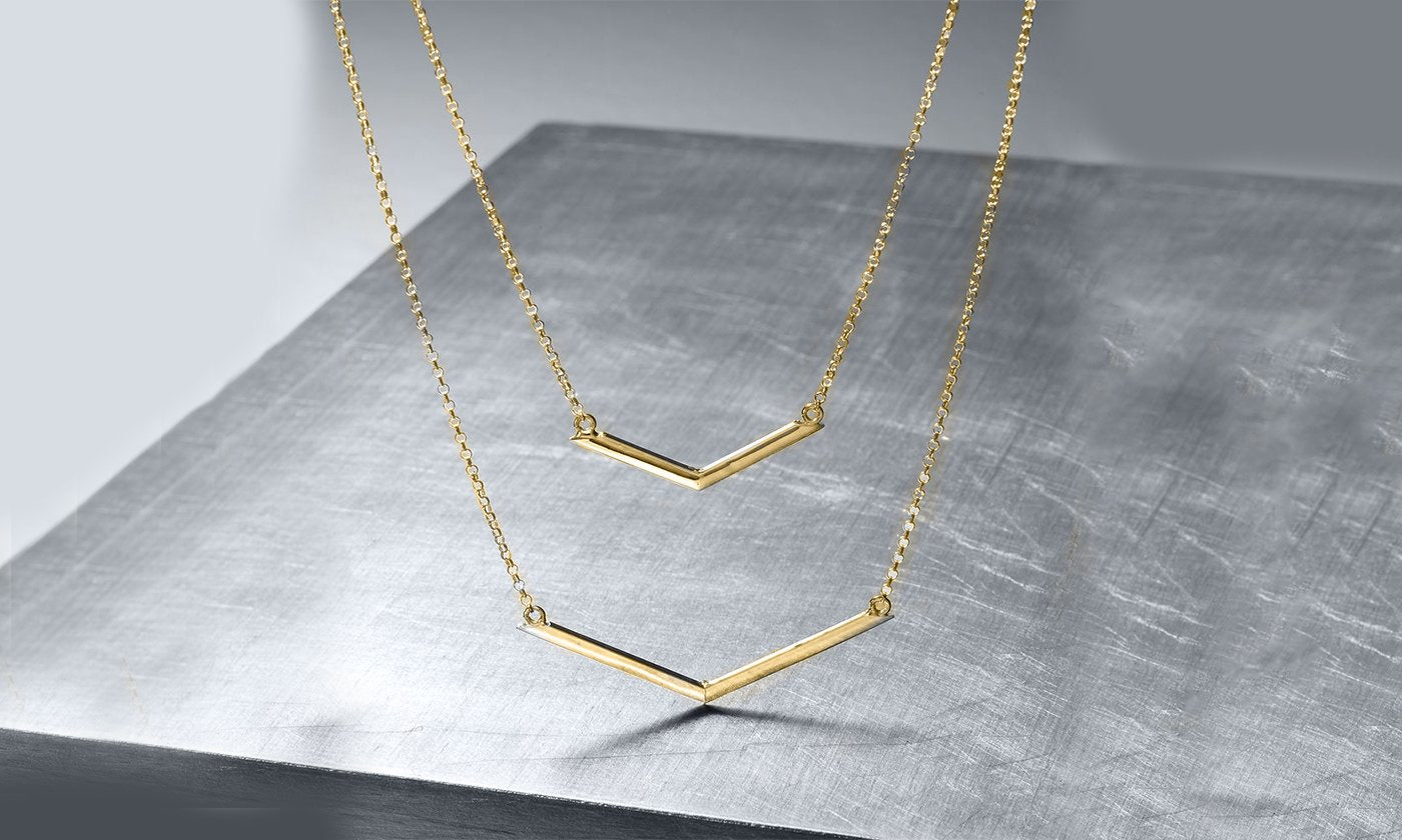 Duo Dangling Chevron Statement Necklace in 18K Gold featuring a unique chevron design, available in gold, rose gold, and white gold options.