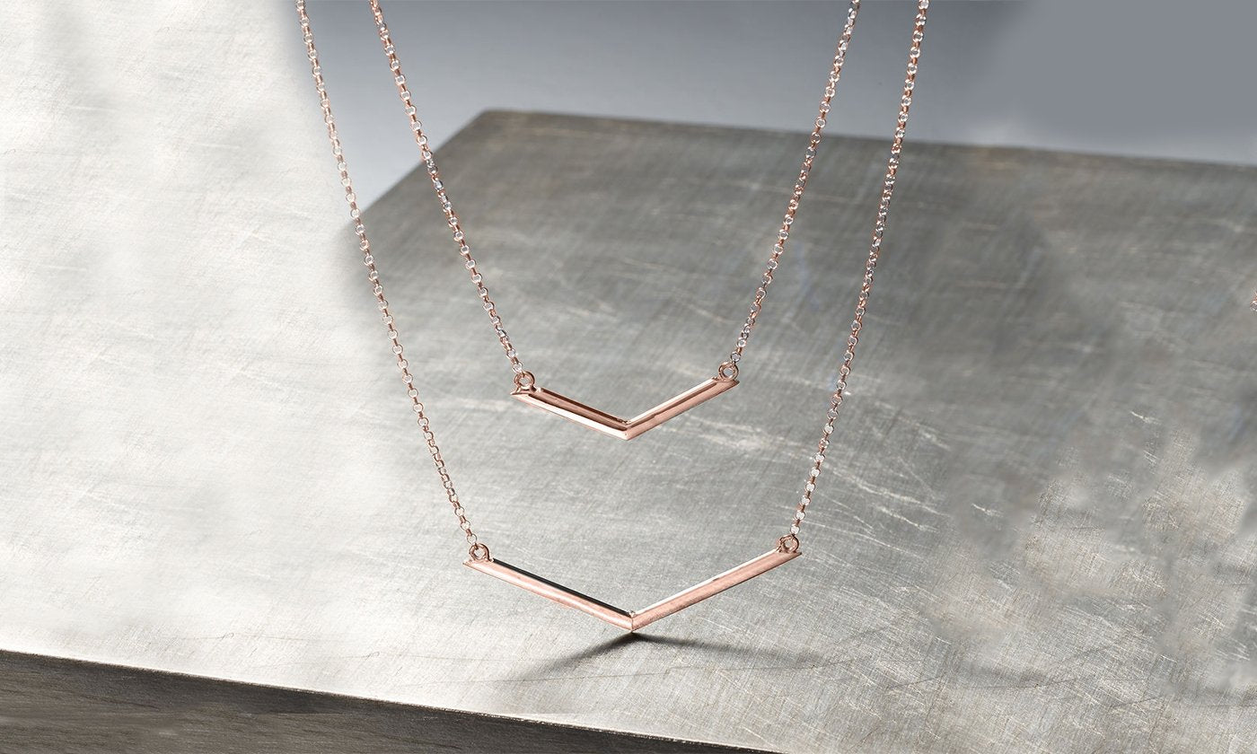 Duo Dangling Chevron Statement Necklace in 18K Gold featuring a unique chevron design, available in gold, rose gold, and white gold options.