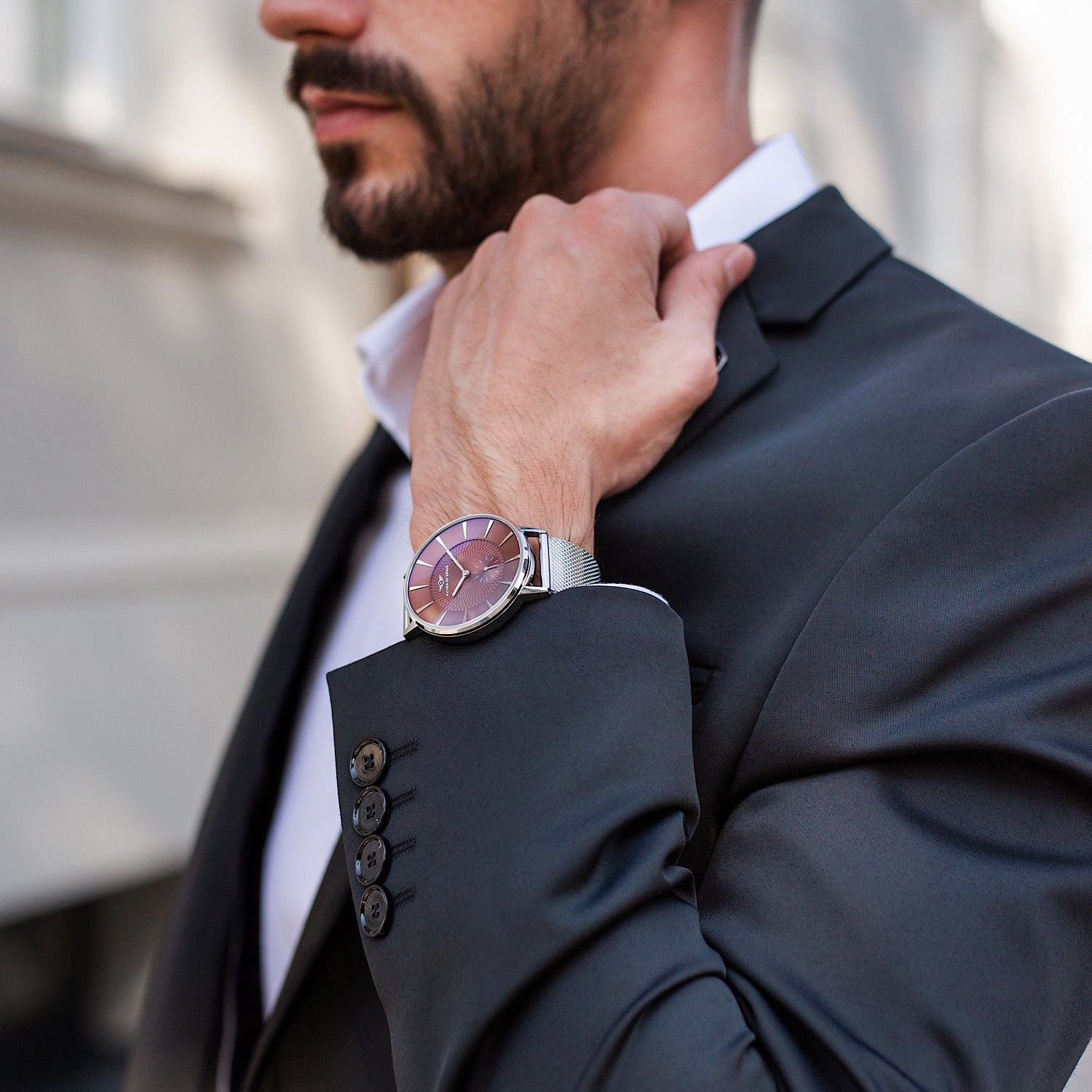 Eclipse Silver Gloss Coffee watch featuring a domed sapphire crystal, diamond cut hands, and a unique guilloche pattern dial.