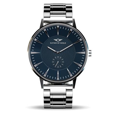 Eclipse Silver Gloss watch with Royal Blue accents, featuring a domed sapphire crystal and intricate guilloche dial pattern.