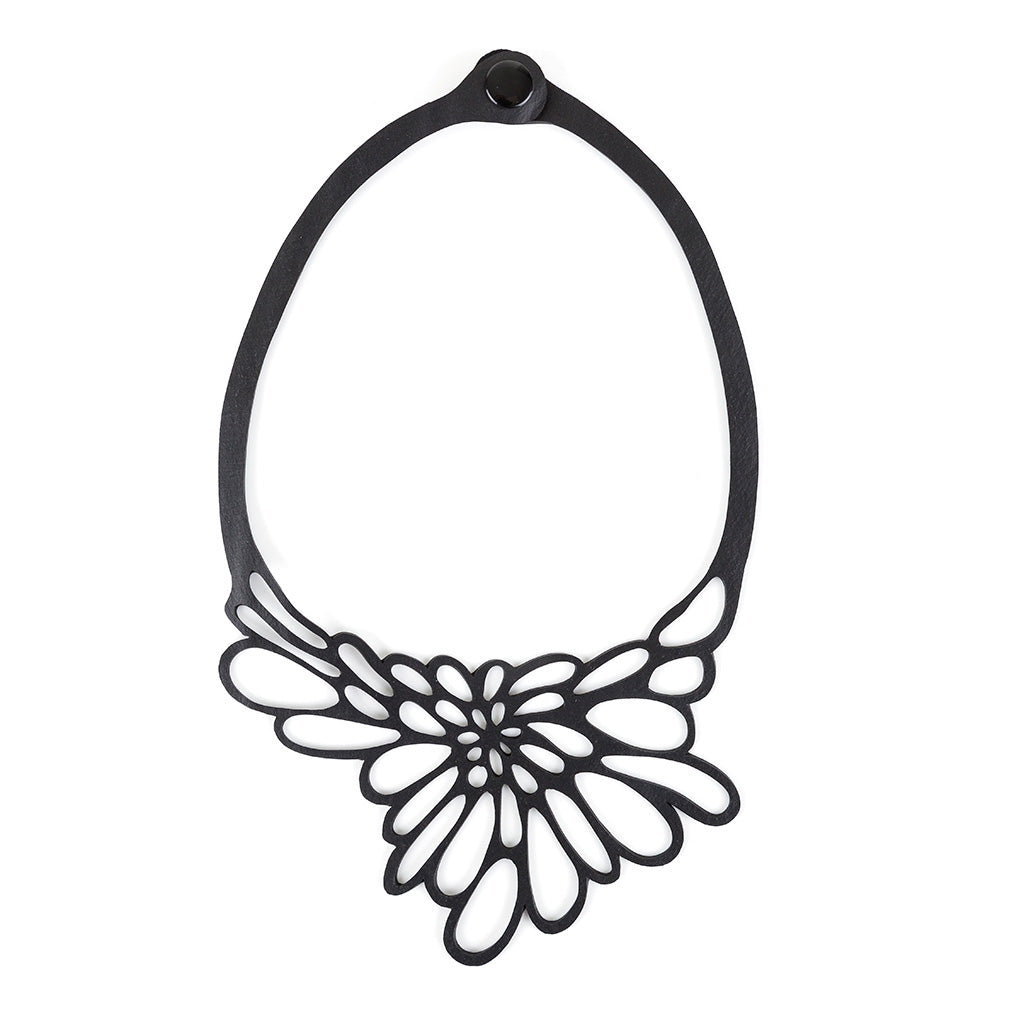 Edelweiss Upcycled Necklace made from recycled rubber, featuring a unique design inspired by the Edelweiss flower, displayed in a luxury gift box.