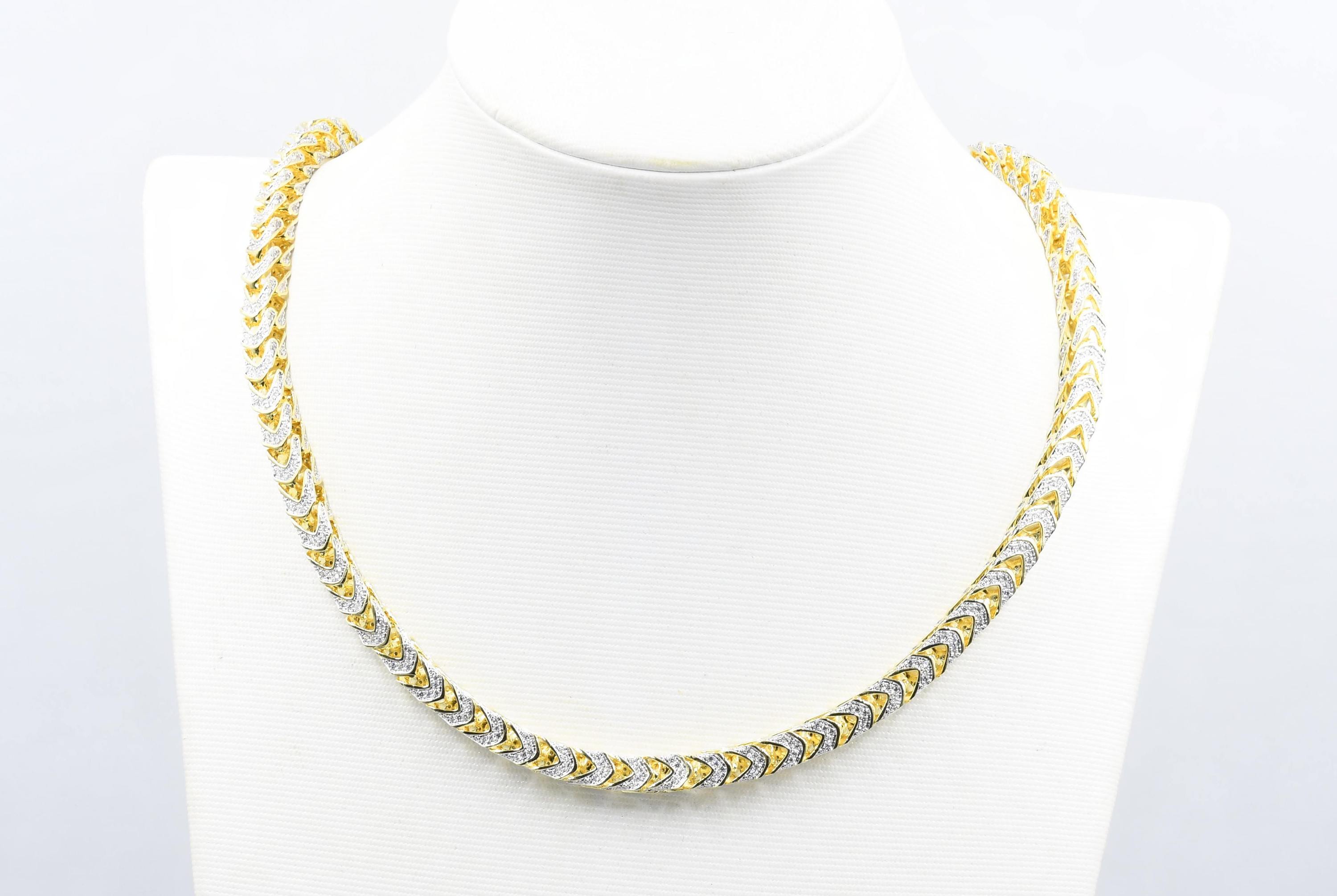 Effervescent CZ Chain featuring a unique mosaic of mixed-cut gems, pearls, and cubic zirconia, elegantly designed for a romantic neckline accent.