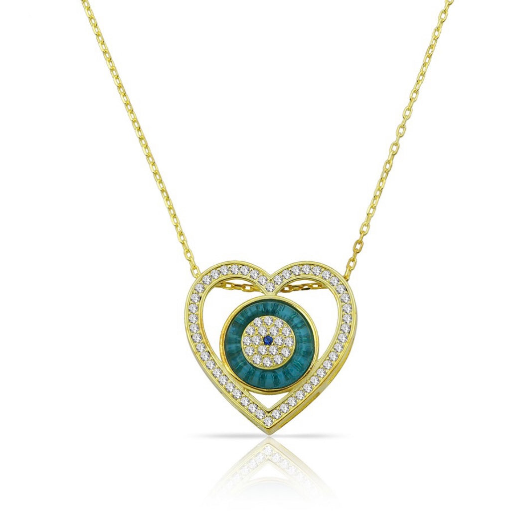 ELAYHA Necklace featuring a turquoise cabochon evil eye pendant framed by sparkling cubic zirconias on a delicate chain.