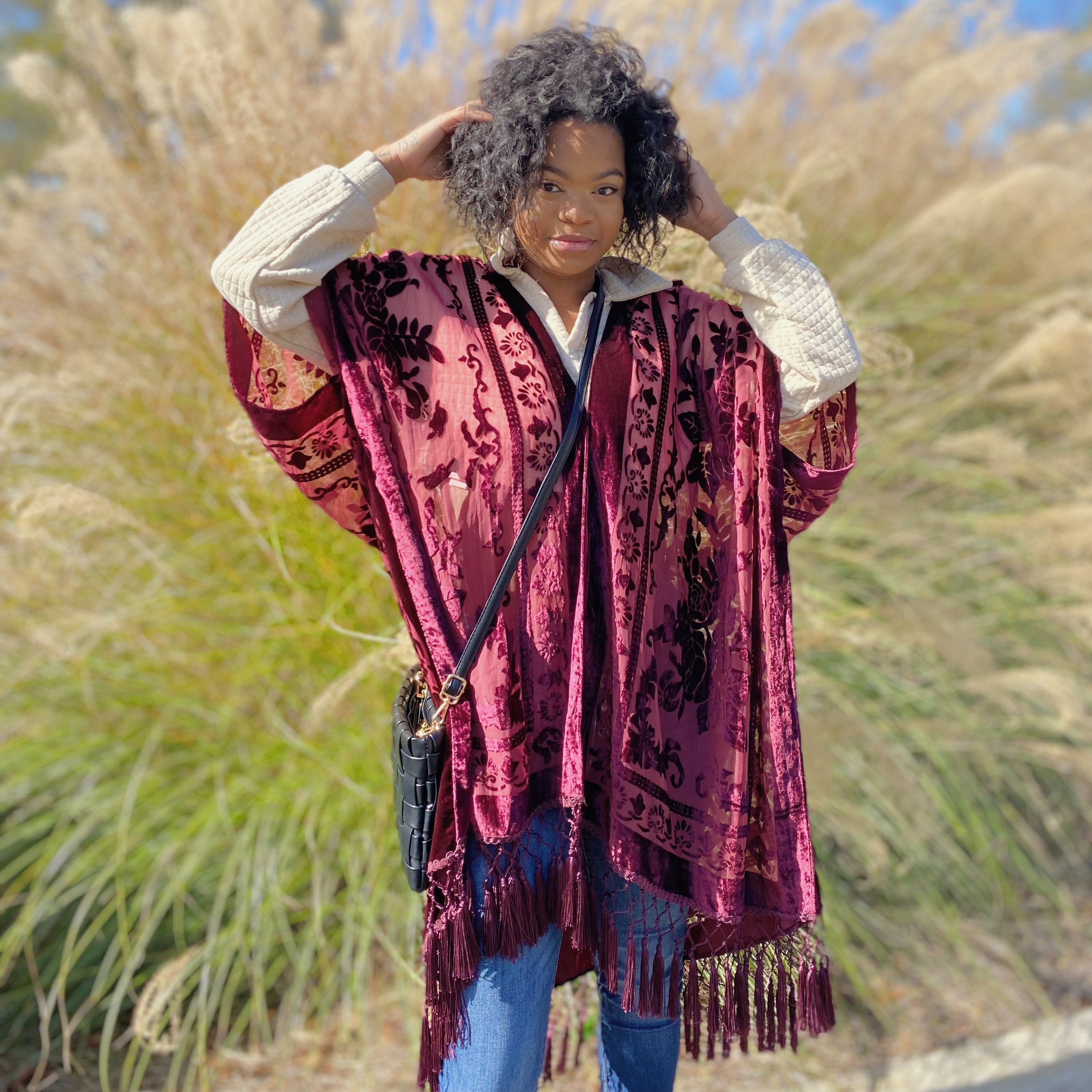 Elegant Boho Burnout Kimono featuring fringed bottoms and velvet details, showcasing its luxurious design and silky tassels.