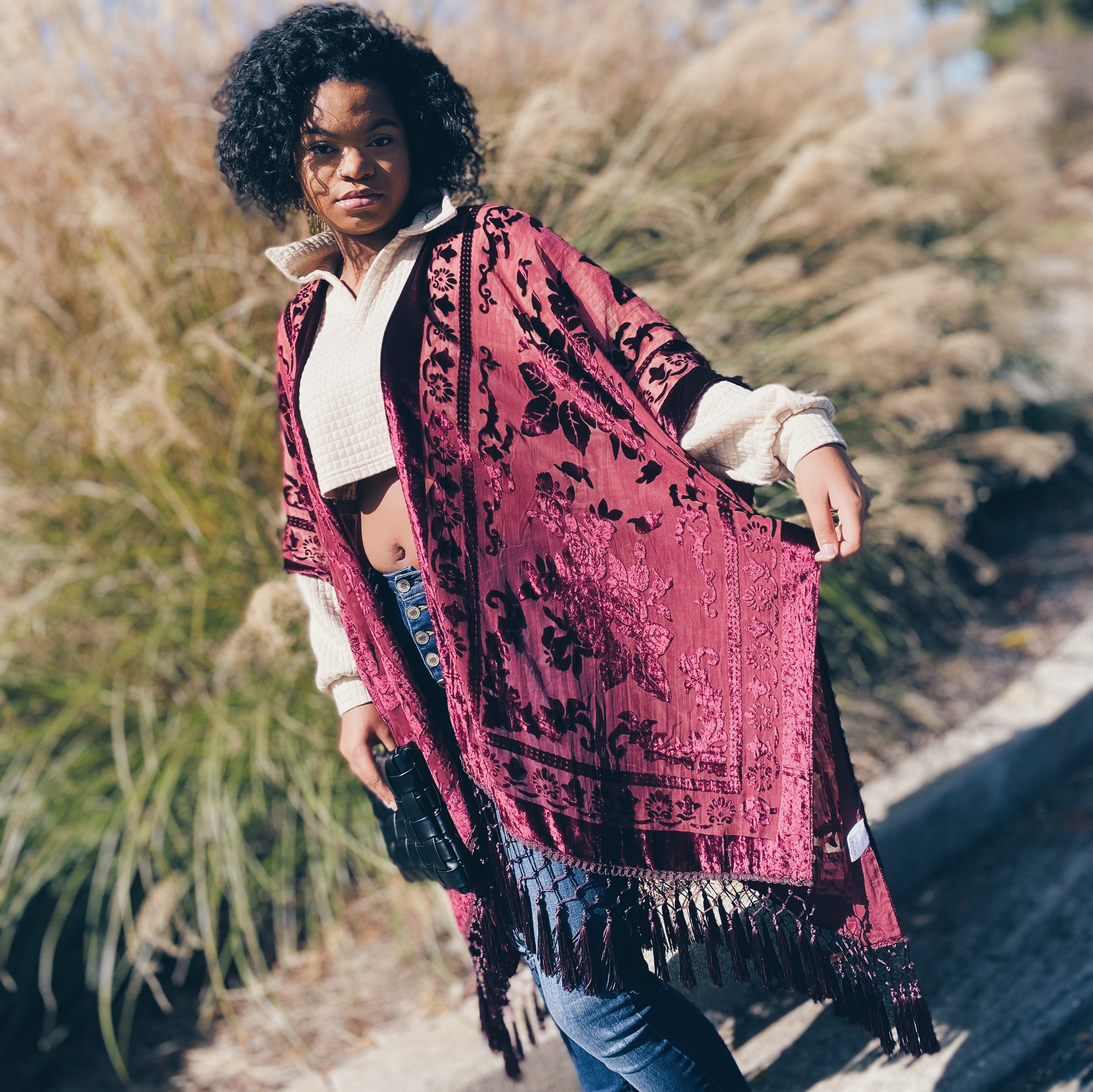 Elegant Boho Burnout Kimono featuring fringed bottoms and velvet details, showcasing its luxurious design and silky tassels.