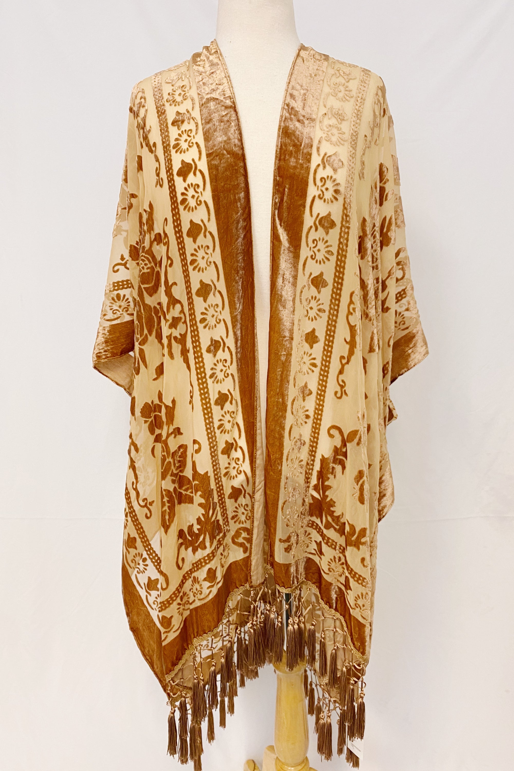 Elegant Boho Burnout Kimono featuring fringed bottoms and velvet details, showcasing its luxurious design and silky tassels.