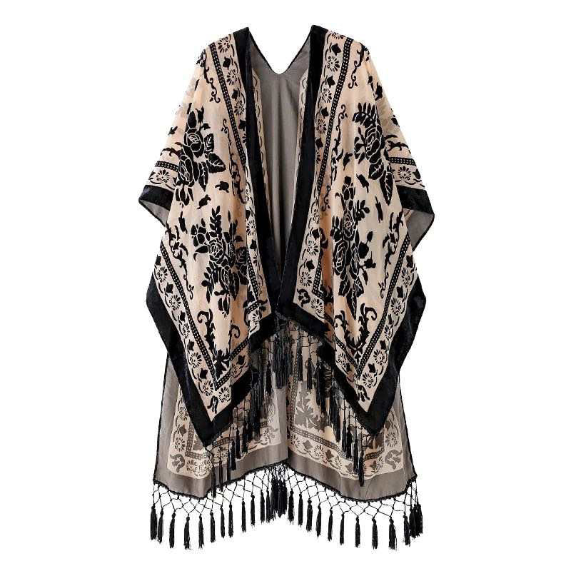 Elegant Boho Burnout Kimono featuring fringed bottoms and velvet details, showcasing its luxurious design and silky tassels.