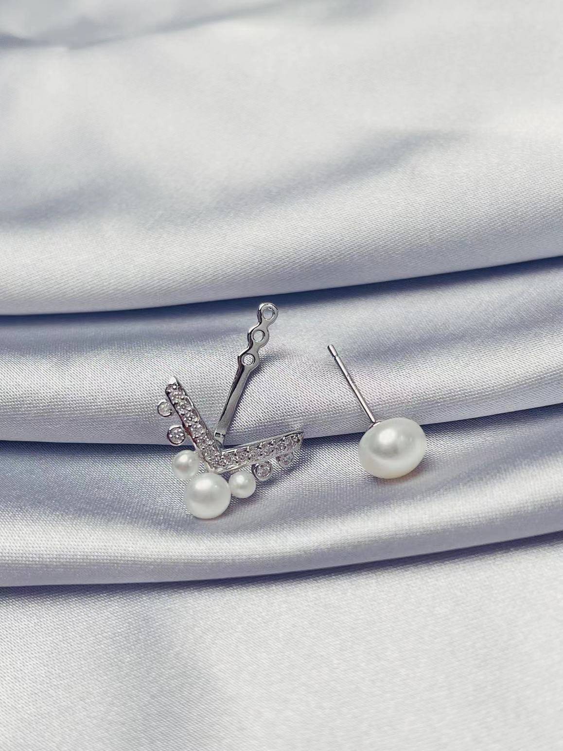 Elegant Freshwater Pearl Earrings WE00058 featuring white semi-round pearls and sterling silver with gold plating.