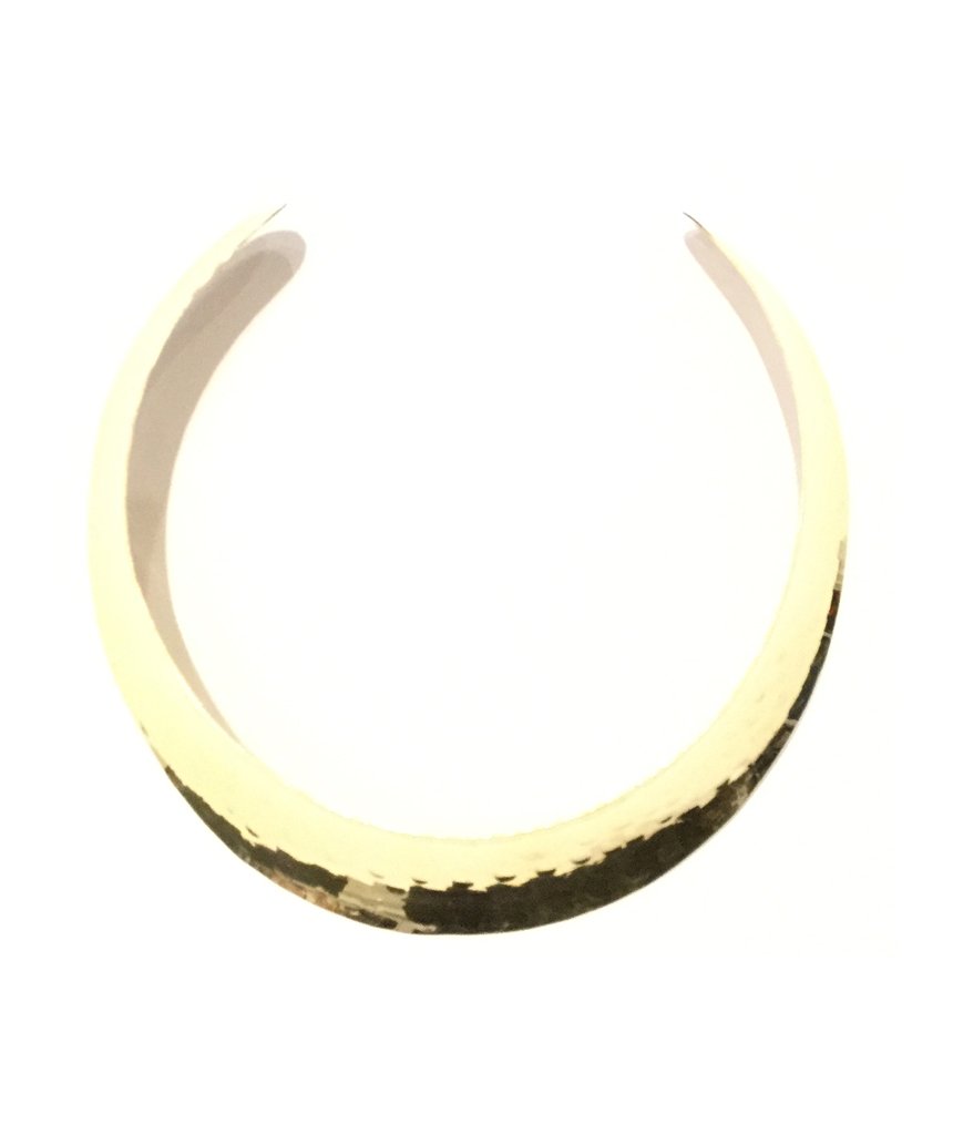 Elegant Hammered Choker in gold and silver finishes, showcasing a minimalist design with a unique hammered texture.