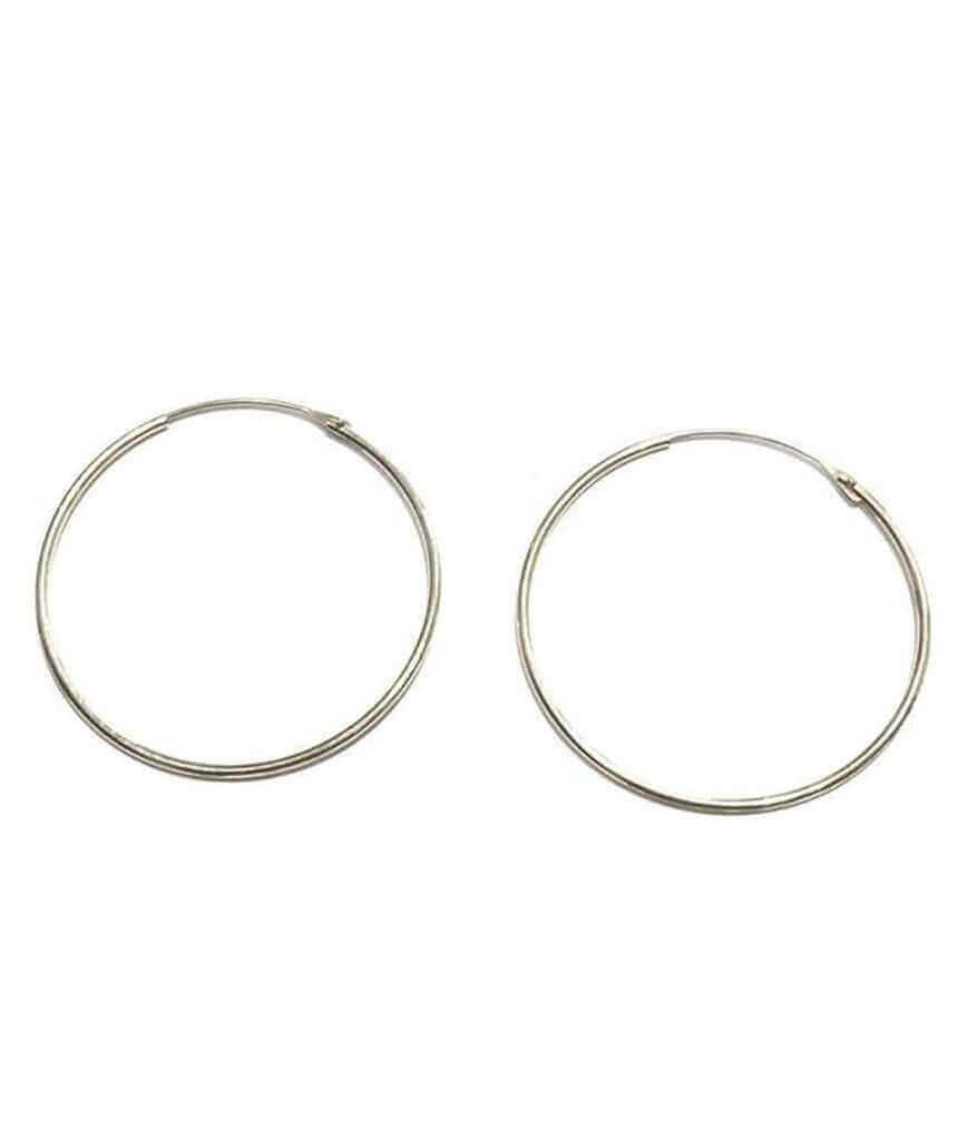 Elegant gold hoop earrings by Urbiana, handmade from brass, lightweight and hypoallergenic, perfect for sensitive skin.