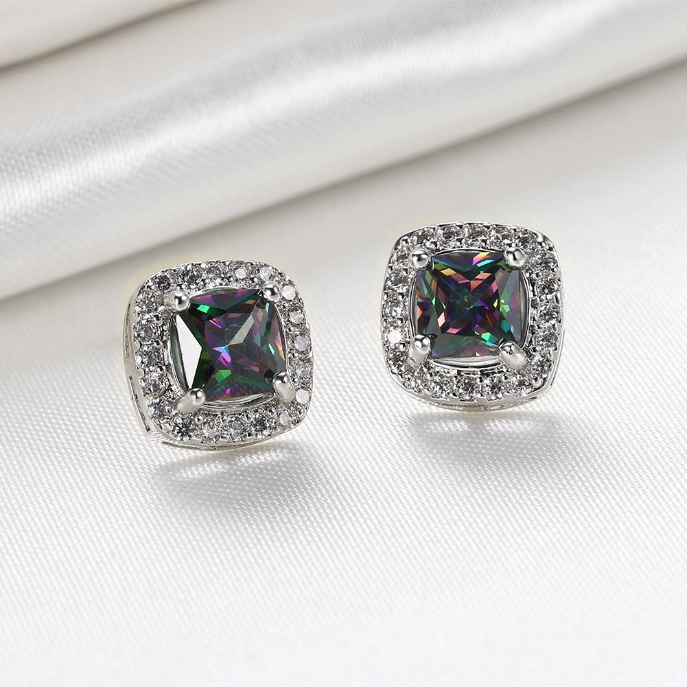 Elements Mystic Topaz Stud Earrings featuring certified crystals set in 18K white gold plating, showcasing a luxurious and elegant design.