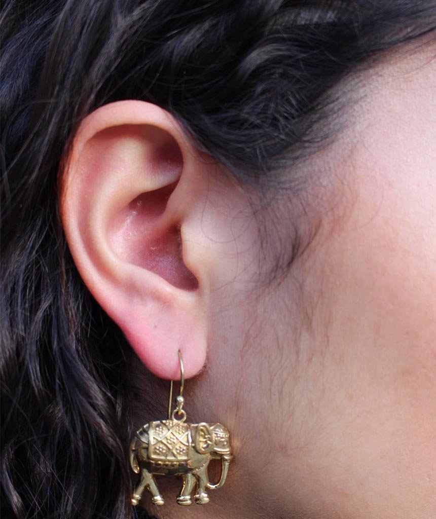 A pair of stylish elephant earrings made from brass and silver, featuring intricate detailing and an adjustable design, perfect for sensitive skin.