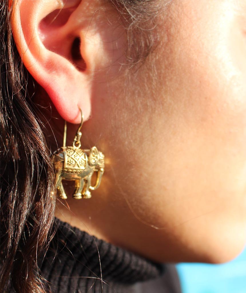 A pair of stylish elephant earrings made from brass and silver, featuring intricate detailing and an adjustable design, perfect for sensitive skin.