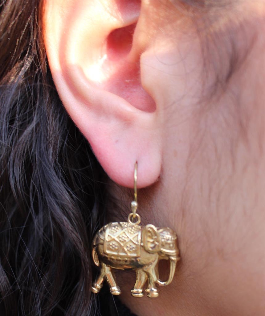 A pair of stylish elephant earrings made from brass and silver, featuring intricate detailing and an adjustable design, perfect for sensitive skin.