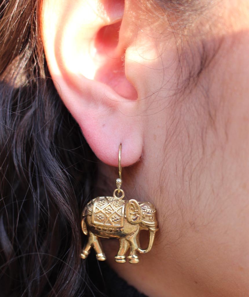 A pair of stylish elephant earrings made from brass and silver, featuring intricate detailing and an adjustable design, perfect for sensitive skin.