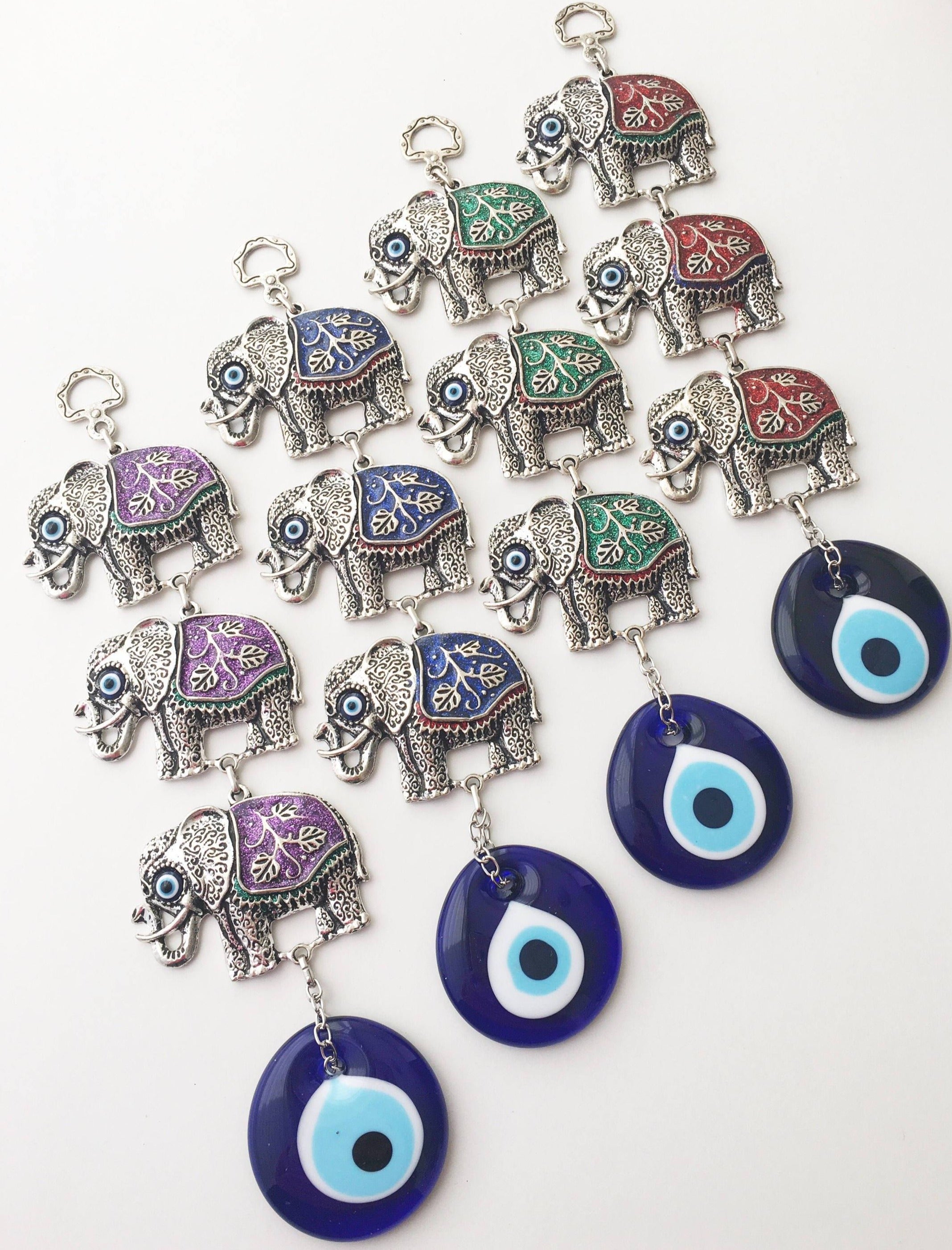 Handmade Elephant Evil Eye Wall Decor featuring a blue evil eye and colorful elephant charm, symbolizing protection and good luck.