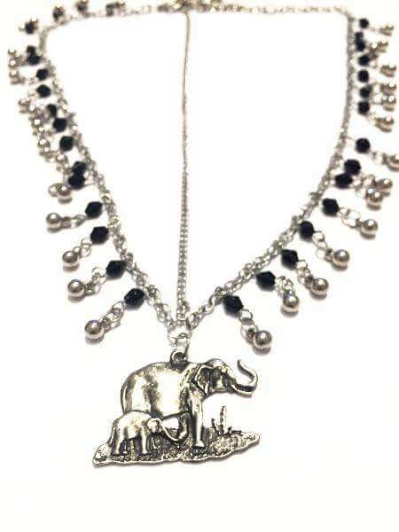 A stylish bohemian headchain featuring an elegant elephant pendant, perfect for festivals and special occasions.