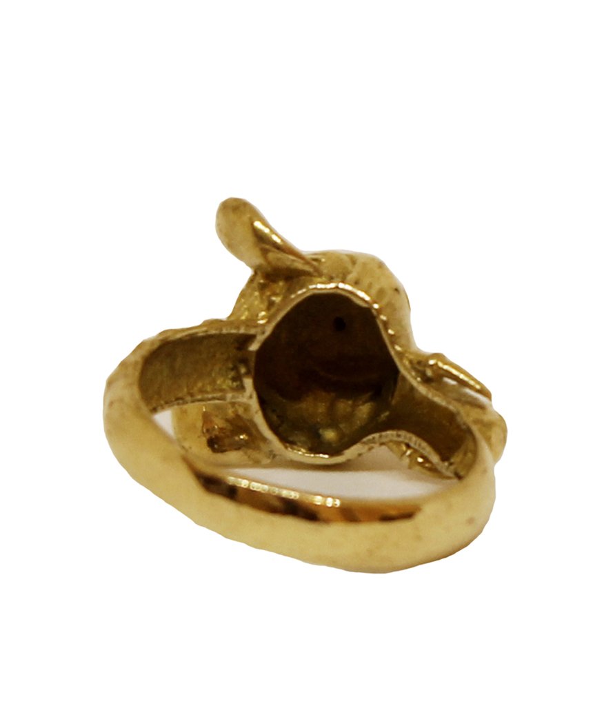 A beautifully crafted elephant ring featuring a semi precious stone, available in gold and silver finishes, showcasing intricate details.