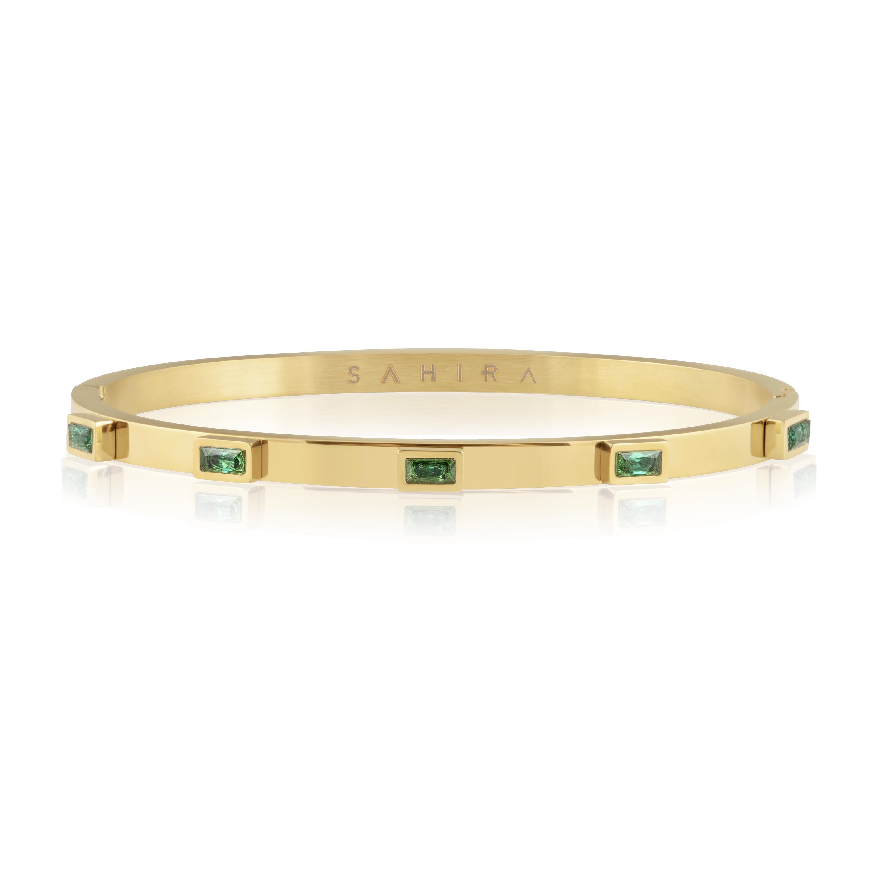 Emerald Baguette Stackable ring featuring 18k gold plating and CZ stones, elegantly designed for stacking.