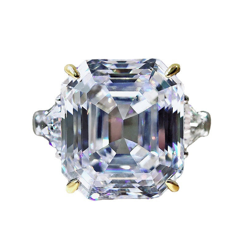 Emerald cut fancy engagement wedding ring in 925 sterling silver with white gold fill, showcasing a sparkling diamond.