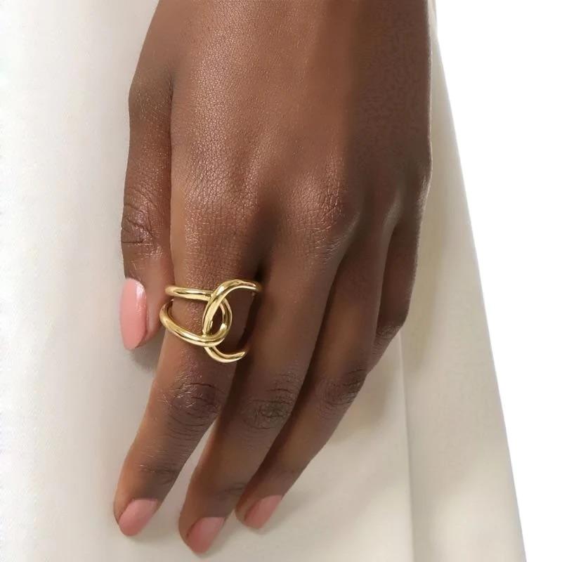 Emily Ring featuring 18k gold plating over stainless steel, showcasing its elegant design and durability.