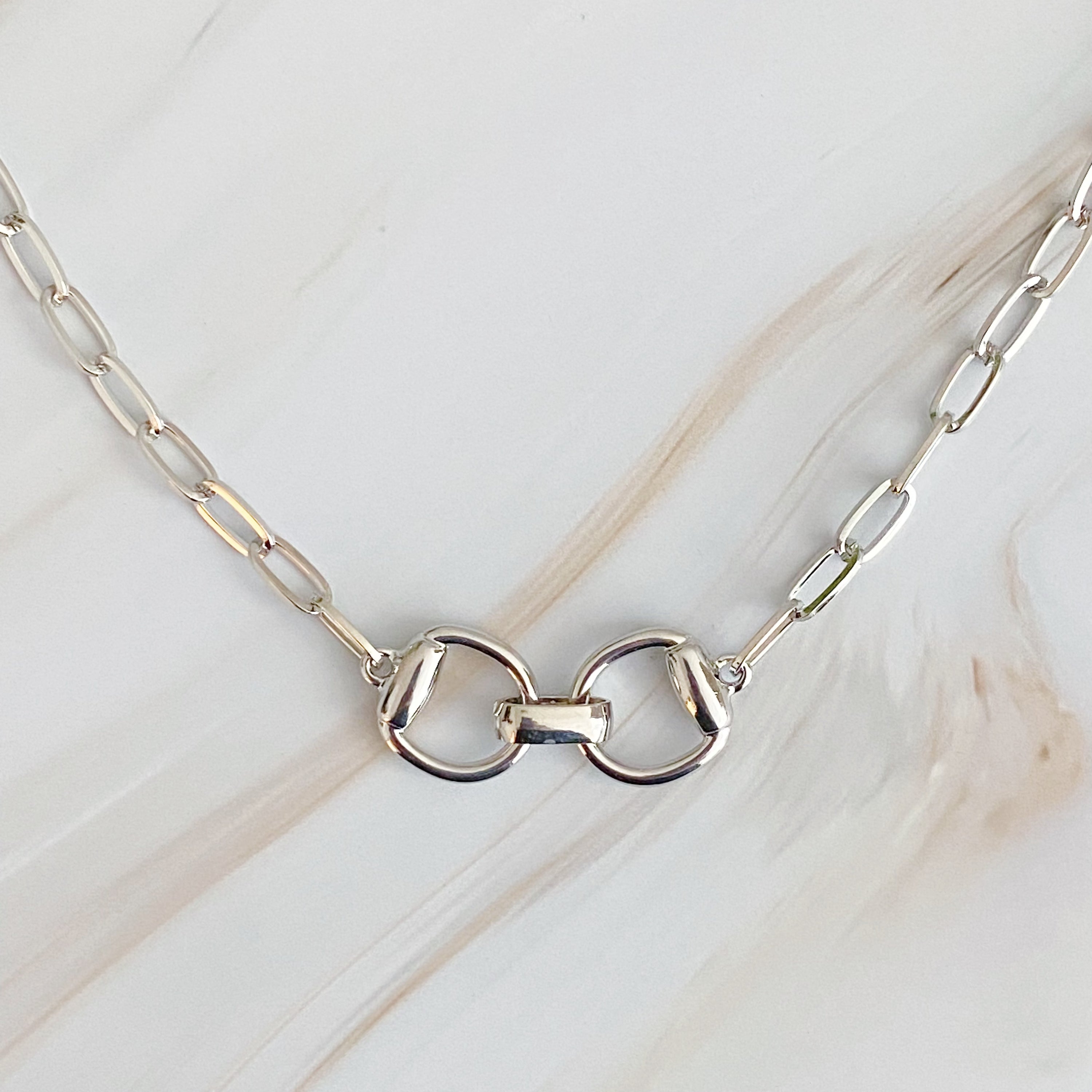 Equestrian Pendant Chain Necklace featuring a designer-inspired buckle, elegant and stylish design.