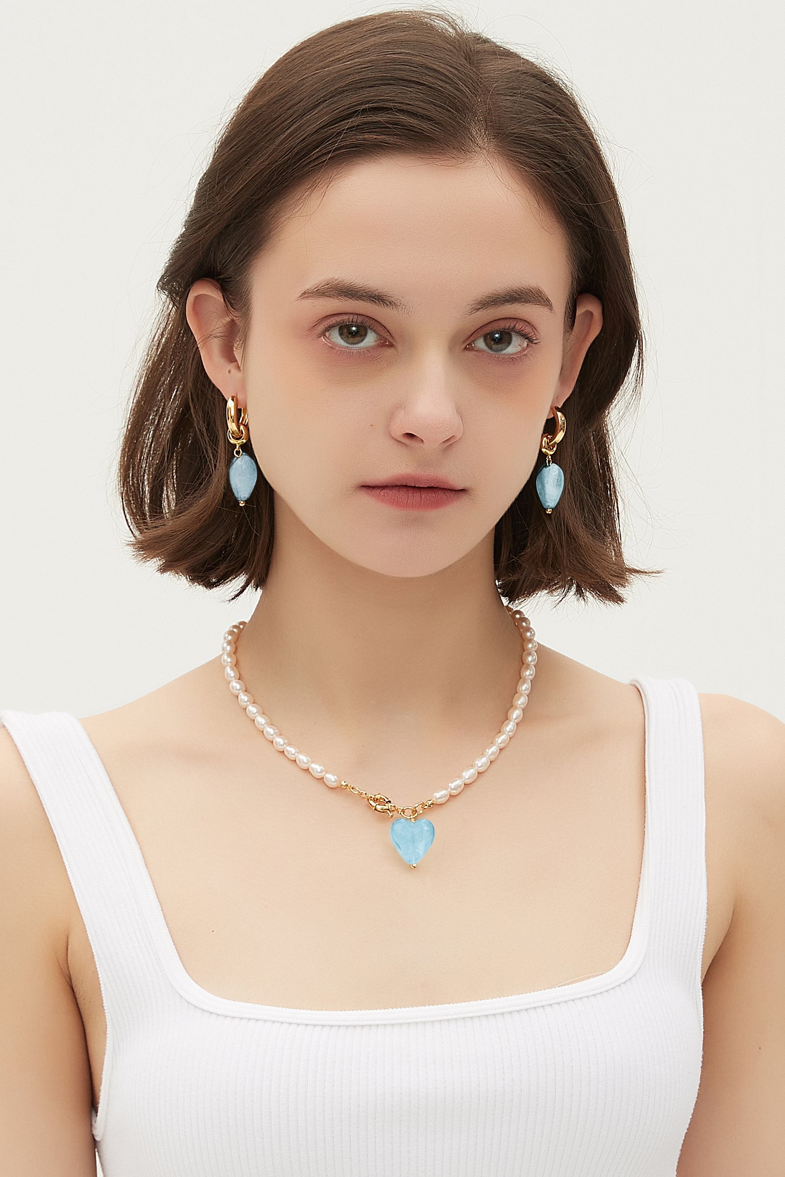 Esmée Aquamarine Glaze Heart Pendant Pearl Necklace featuring baroque pearls and colorful glass pendant, elegantly designed for everyday wear.