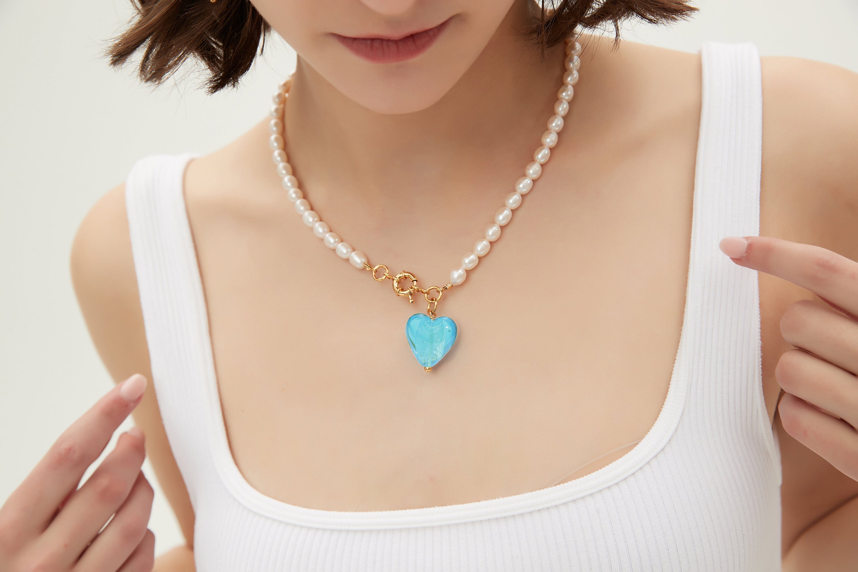 Esmée Aquamarine Glaze Heart Pendant Pearl Necklace featuring baroque pearls and colorful glass pendant, elegantly designed for everyday wear.