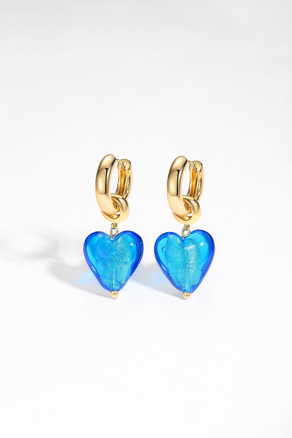 Esmée Sky Blue Glaze Heart Dangle Earrings featuring colorful handmade glass hearts and 18k gold plated hoops.