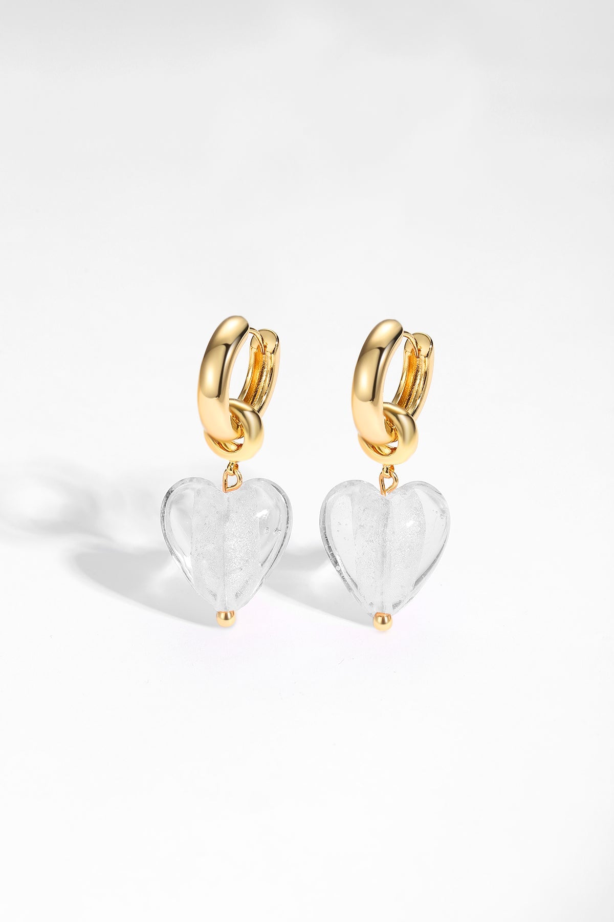 Esmée White Clear Glaze Heart Dangle Earrings featuring colorful glass hearts and 18k gold plated hoops.