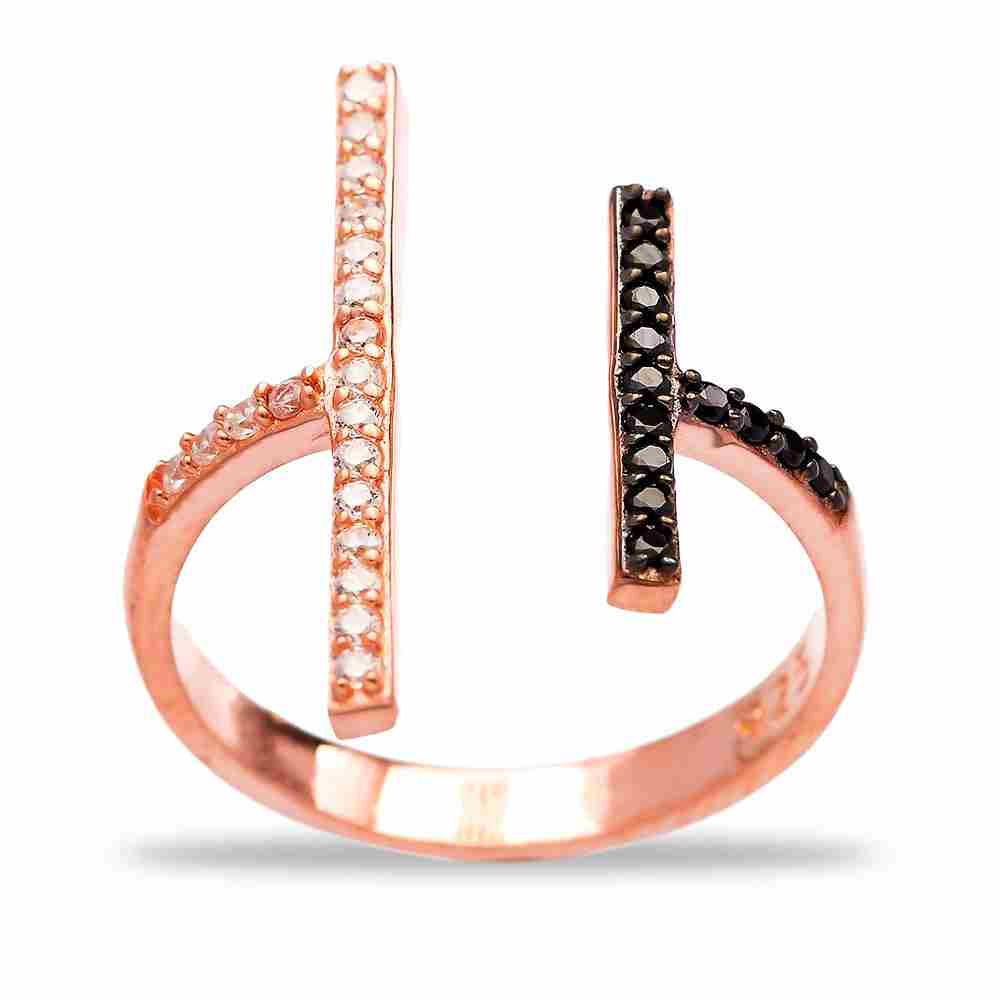 The ESTA Ring featuring black and white cubic zirconias set in a rose gold plated sterling silver open cuff design, showcasing its elegant asymmetrical lines.