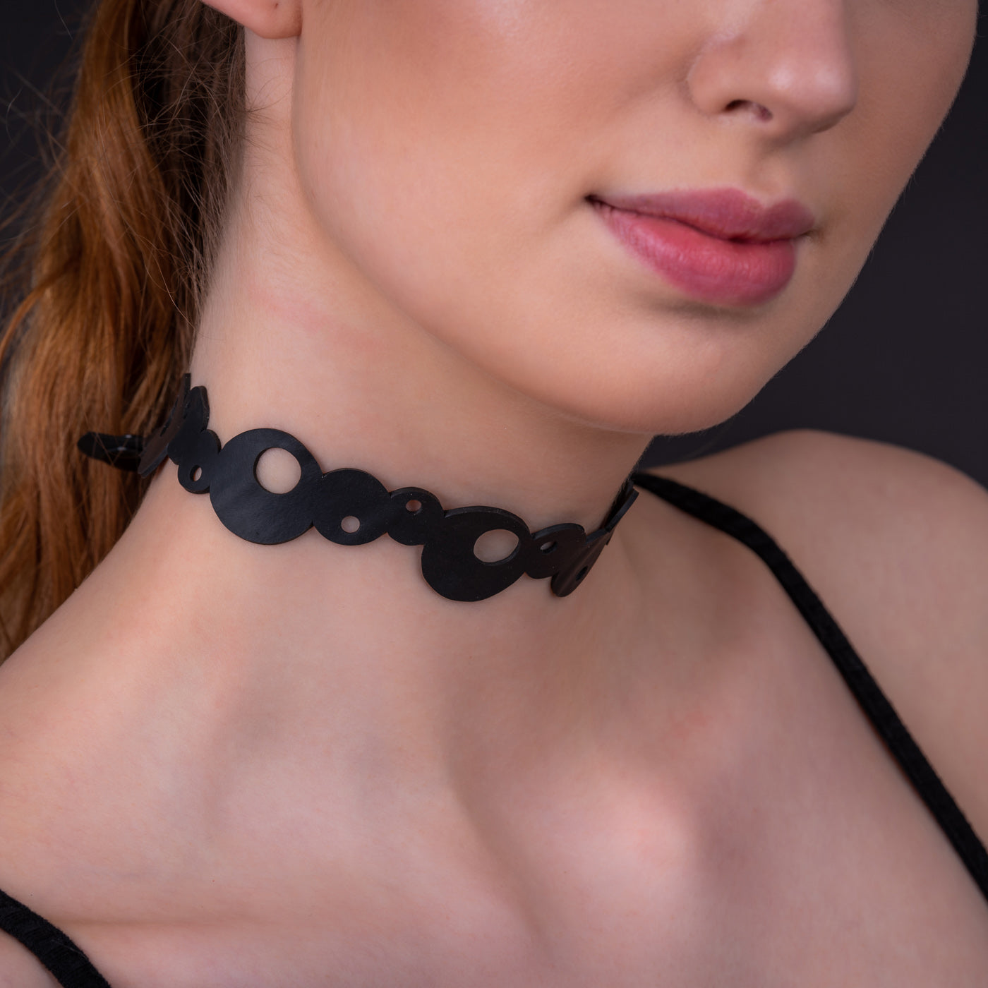 Eternity Recycled Rubber Choker featuring adjustable buttons and unique texture, perfect for bohemian style.