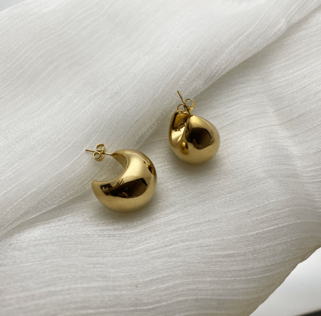 Eugene Boat Earrings featuring a unique boat design, crafted from stainless steel with an 18Kt yellow gold coating, lightweight and stylish.